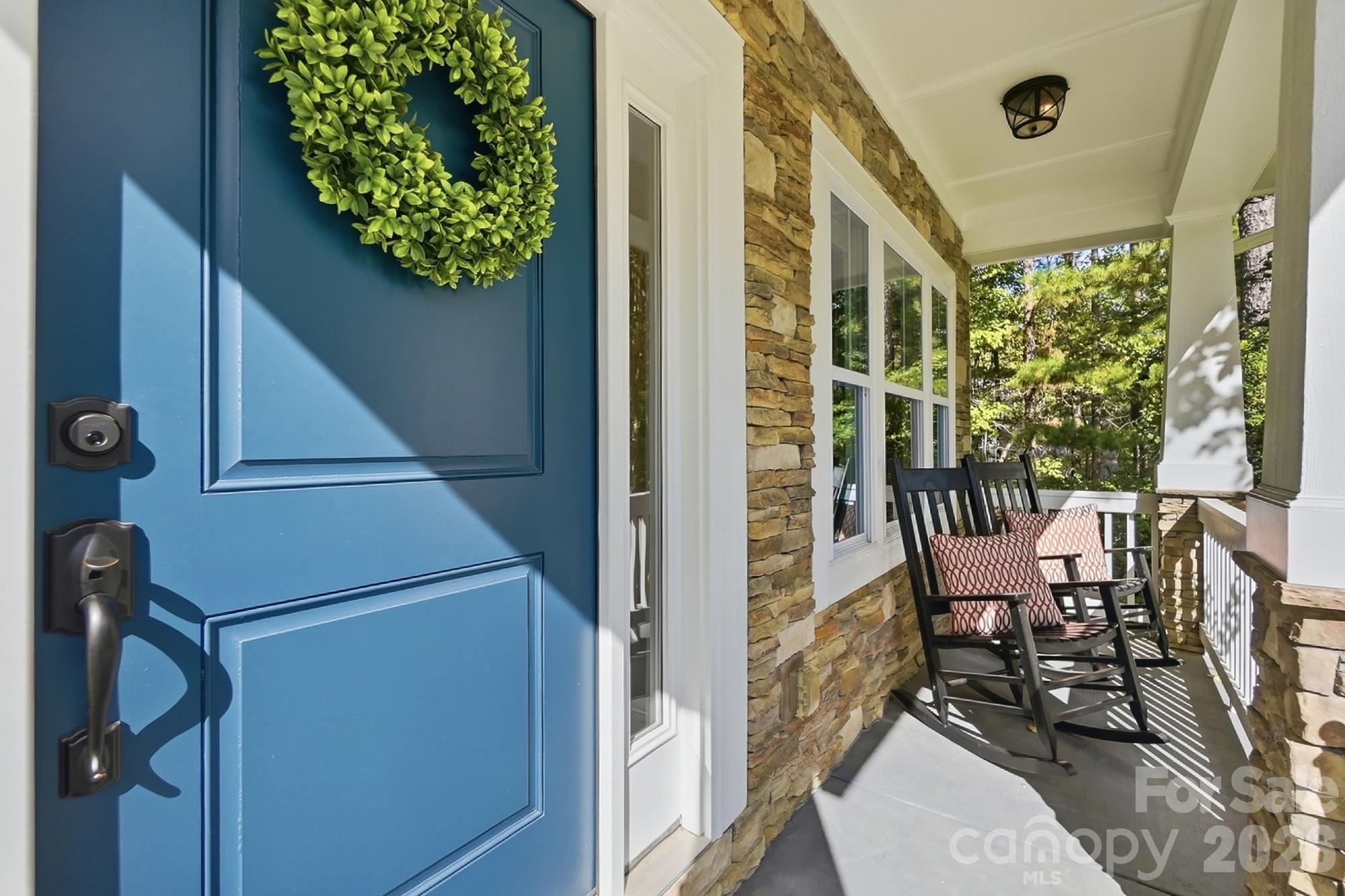 Rocking chair front porch overlooking the Mineral Springs Greenway - 1205 Crofton Drive, Waxhaw