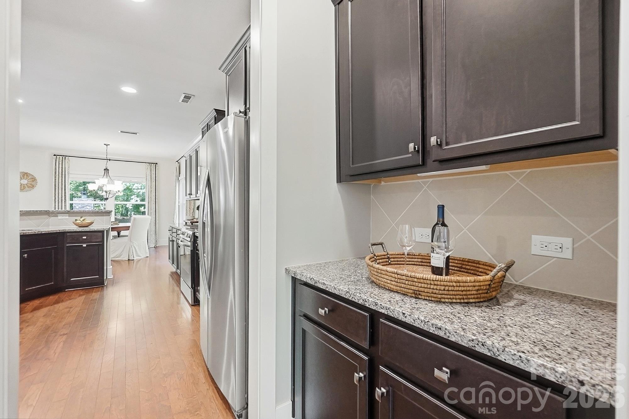 Butlers pantry connecting dining room to kitchen - 1205 Crofton Drive, Waxhaw