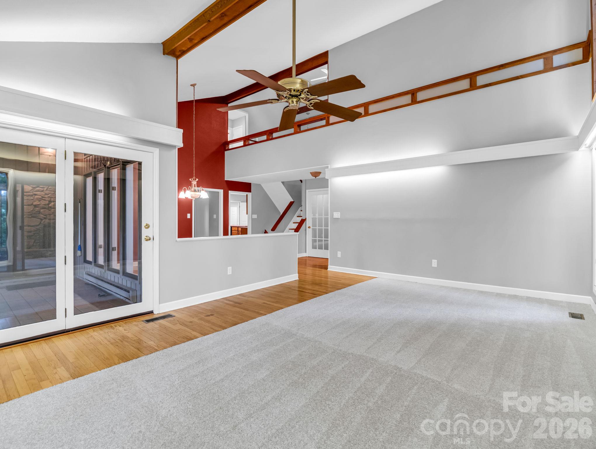 Family Room with doors to the covered patio - 10 Chestnut Ridge Road, Mills River