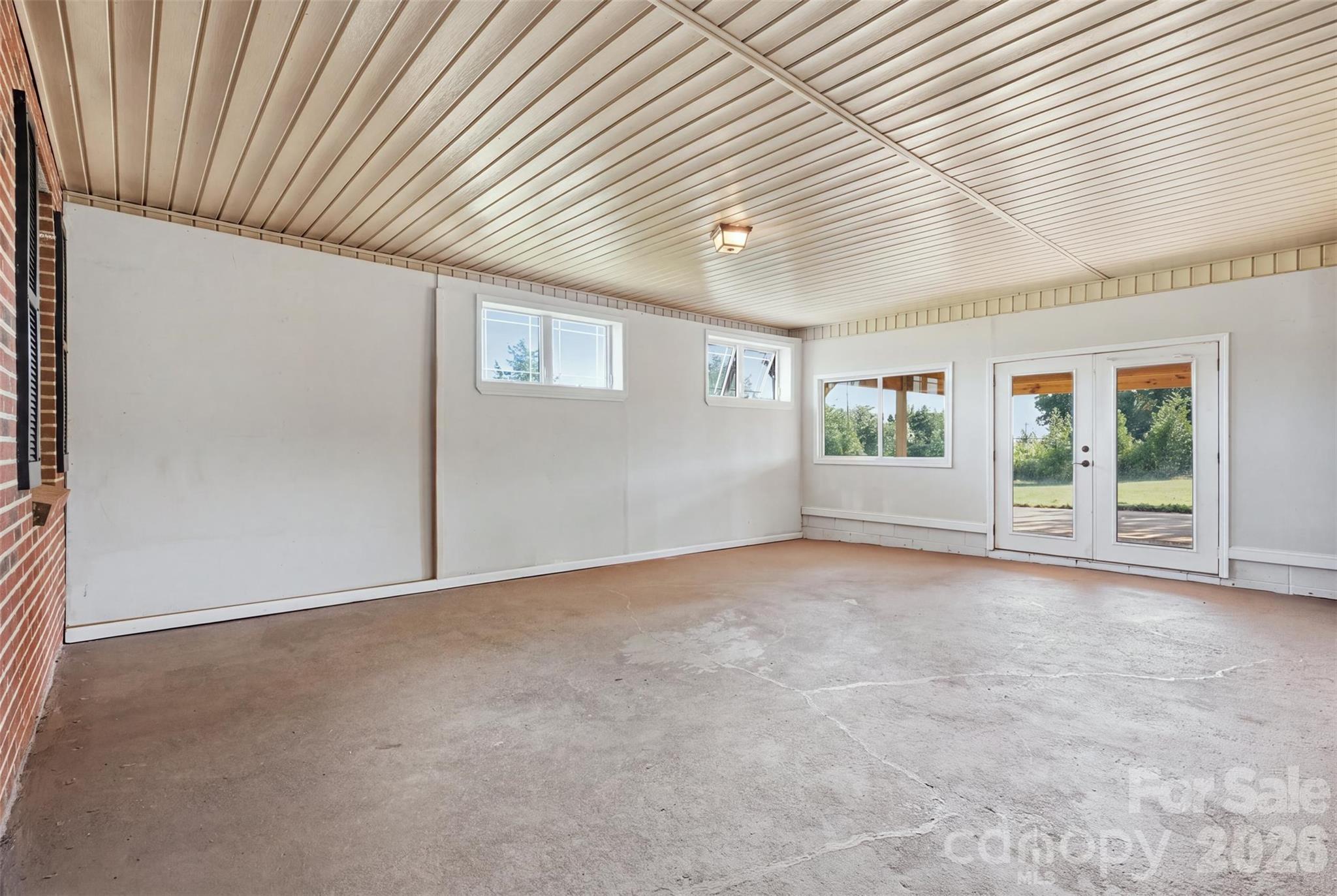 Former garage converted into multi faceted flex room w/tons of storage as well - 3881 Summerow Road, Maiden