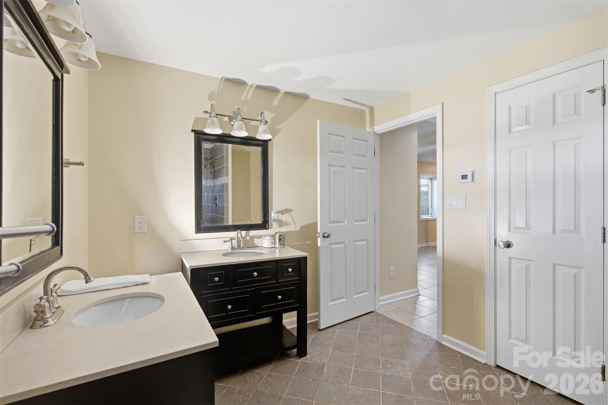 Heated floors in bathroom of second Primary on lower level. Wheelchair accessible. - 3881 Summerow Road, Maiden
