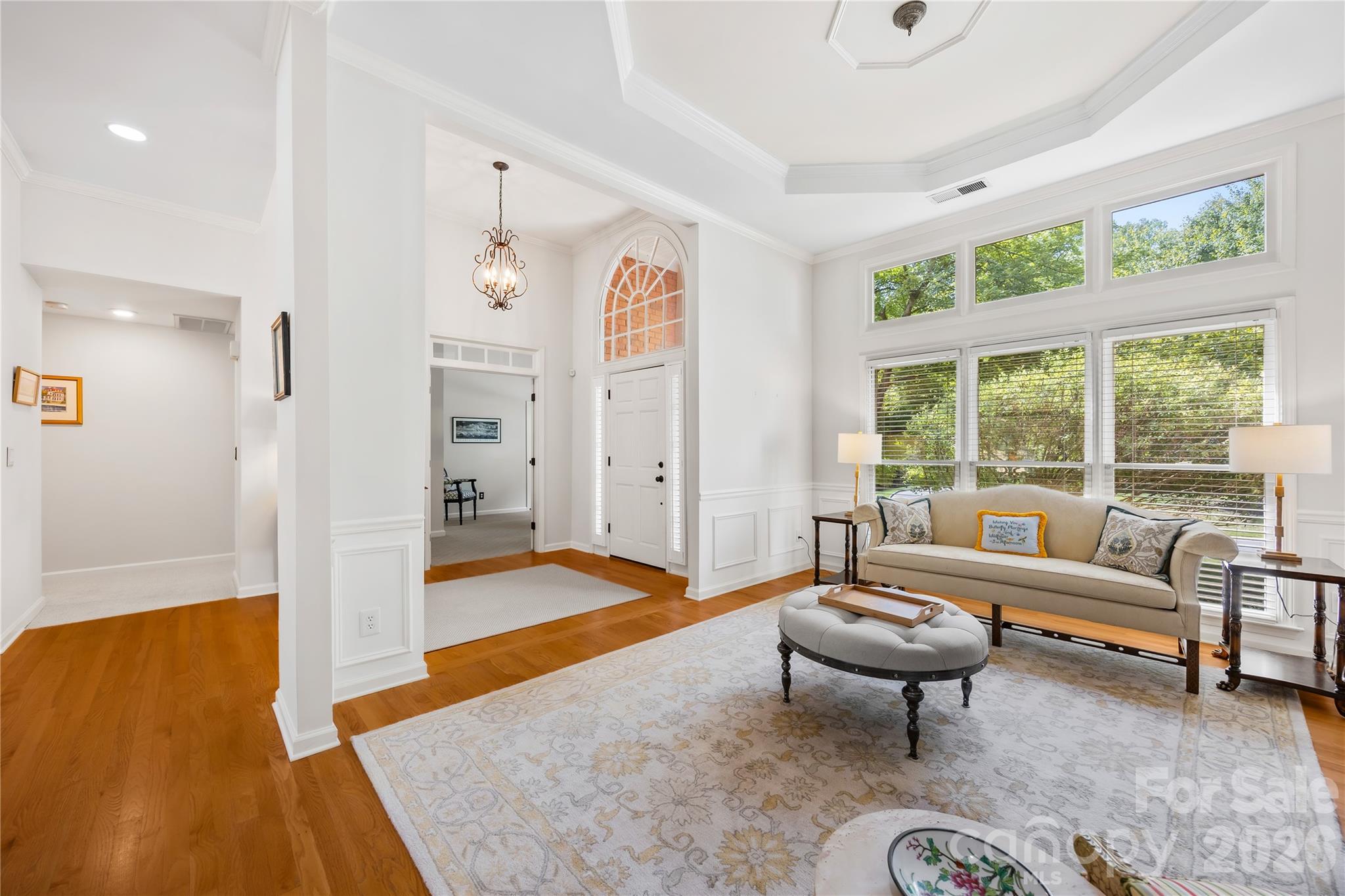 Dining room with hardwood floors an- and high ceiling with a gorgeous trey! - 15728 Delancey Lane, Huntersville