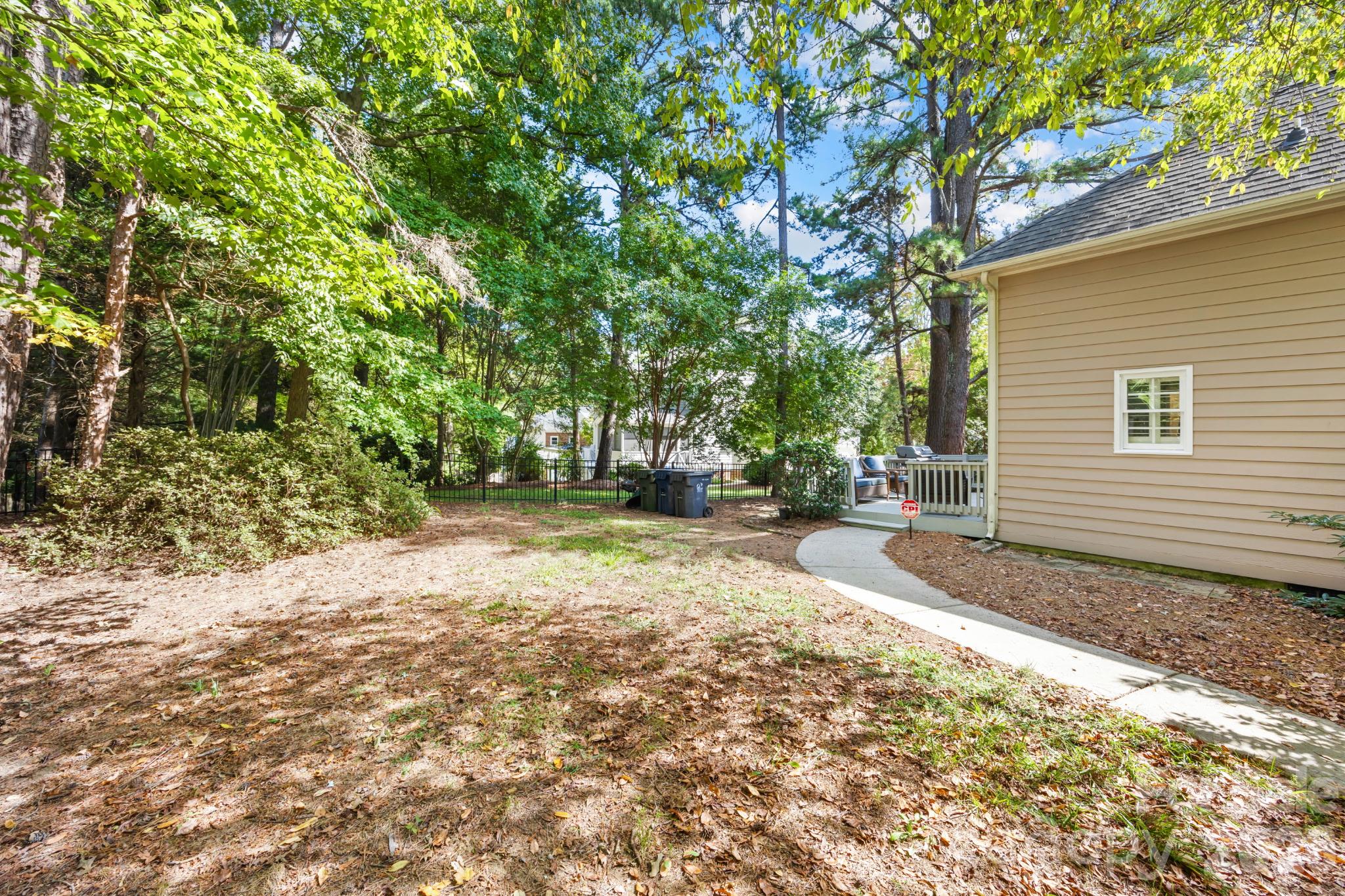 Side and back yard is fully fenced - 15728 Delancey Lane, Huntersville