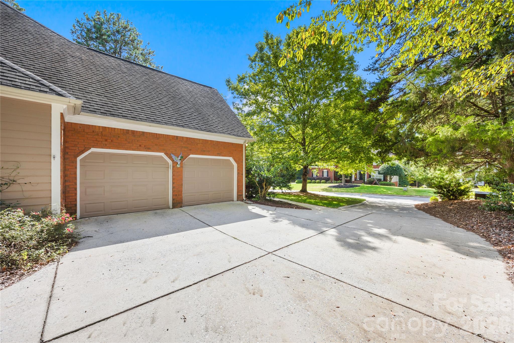 Large driveway and 2 car garage - 15728 Delancey Lane, Huntersville