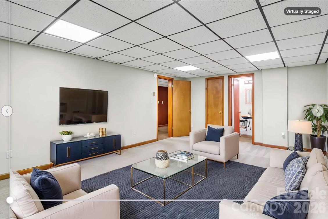 virtually staged: lower level bonus room with full bath - 10 Chestnut Ridge Road, Mills River