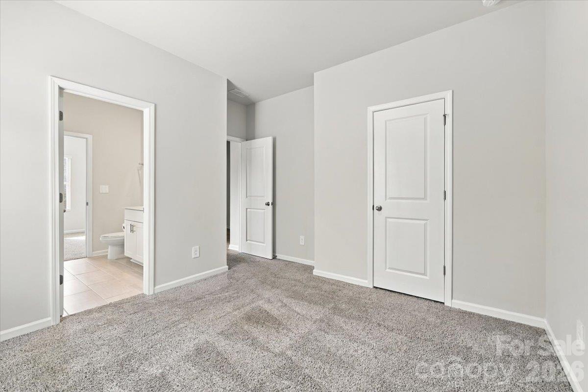 Bed 3 with jack-n-jill bath. Lots of natural light. - 151 Bird Dog Drive, Mooresville