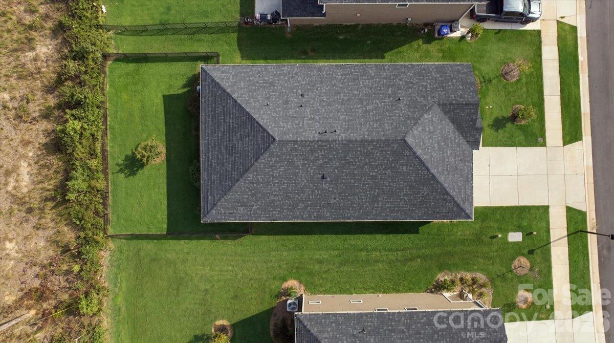 Aerial view showing no back neighbor- just some trees... Great fenced yard! - 151 Bird Dog Drive, Mooresville