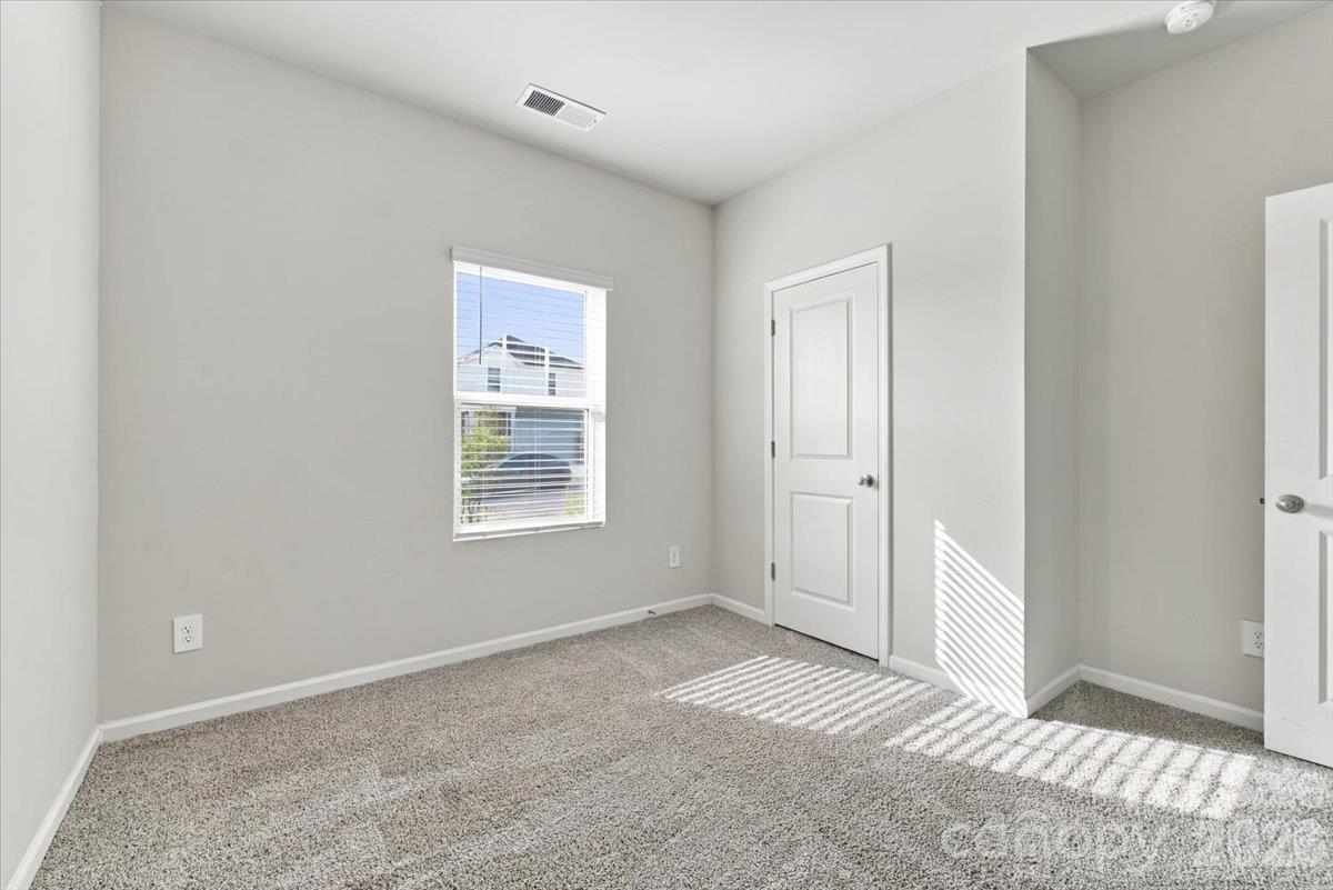 Bed 2 with jack-n-jill bath. Natural light is plentiful - 151 Bird Dog Drive, Mooresville