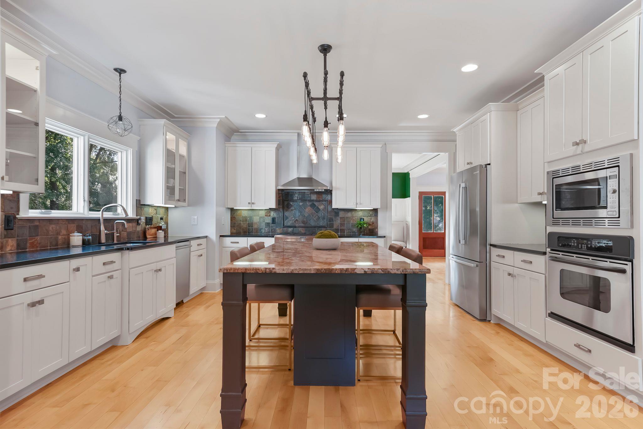 Large kitchen island plus stainless steel appliances - 268 Milford Circle, Mooresville