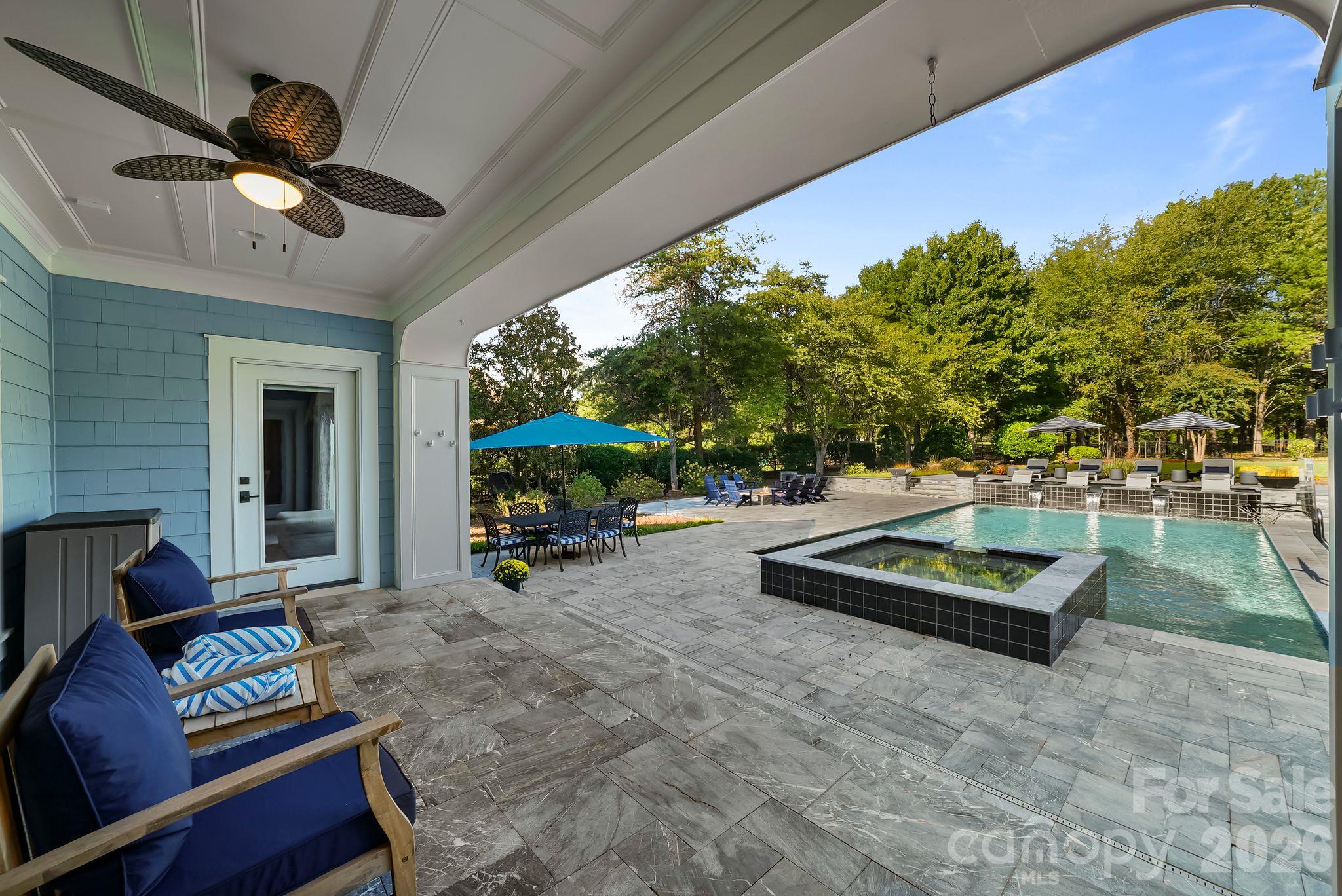 Enjoy the view of your backyard retreat from your covered back patio - 268 Milford Circle, Mooresville
