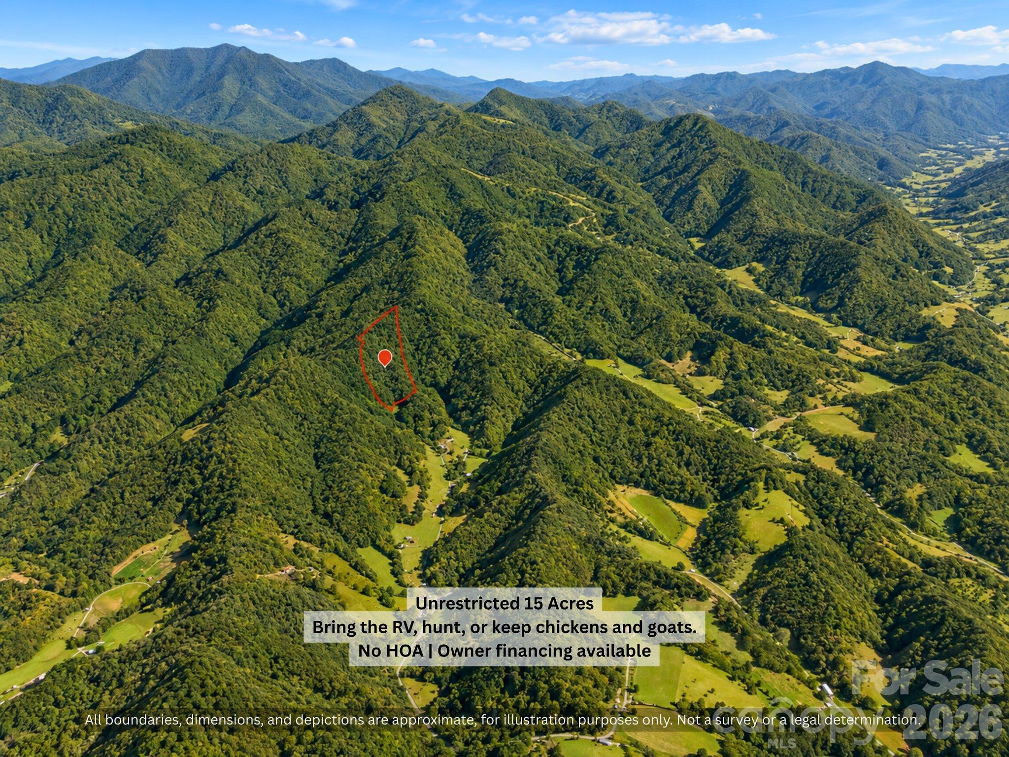 Wide aerial of the Blue Ridge Mountains in Mitchell County, NC showing this 15-acre wooded tract - 99999 Bee Branch Road, Bakersville