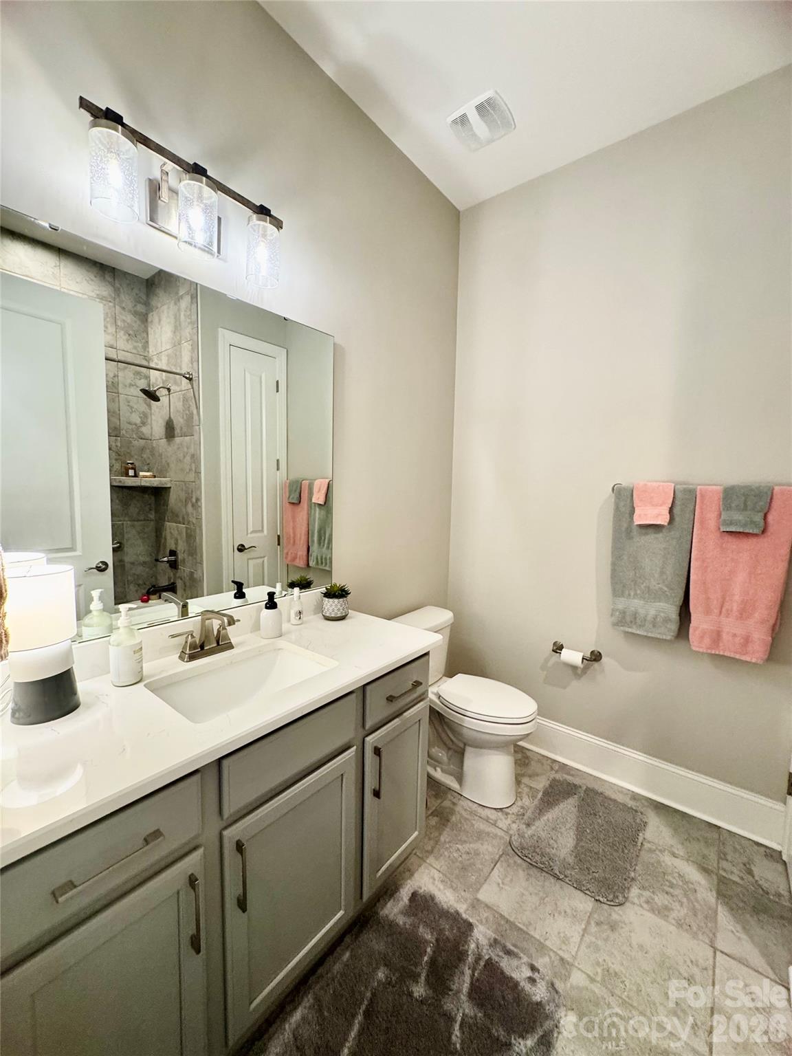 Guest bath downstairs which is one of the three full baths - 9065 Treetop Way NW, Concord