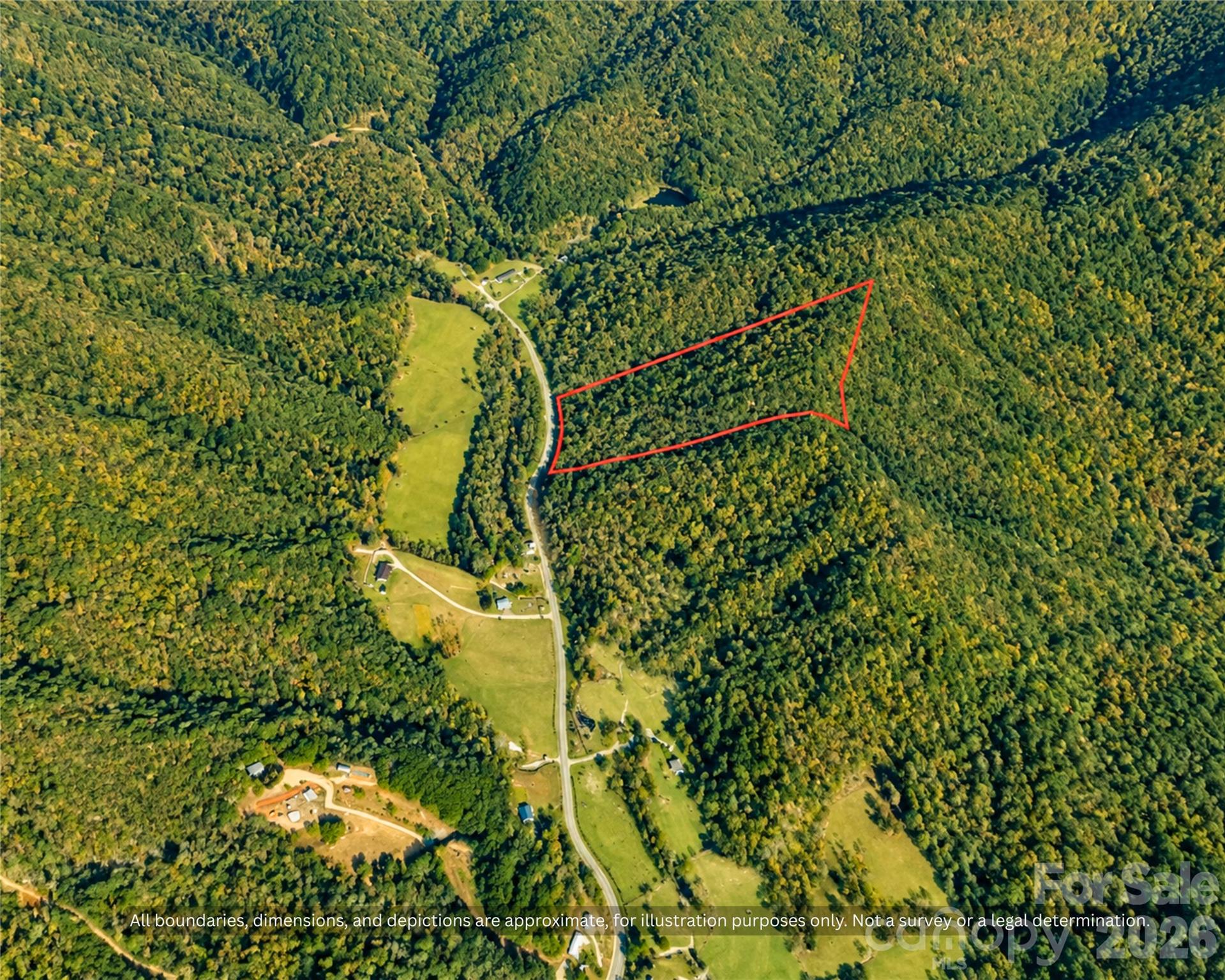 Wide aerial of the rolling foothills and farm valleys around the property in Alexander County - 99999 Boone Gap Lane, Taylorsville