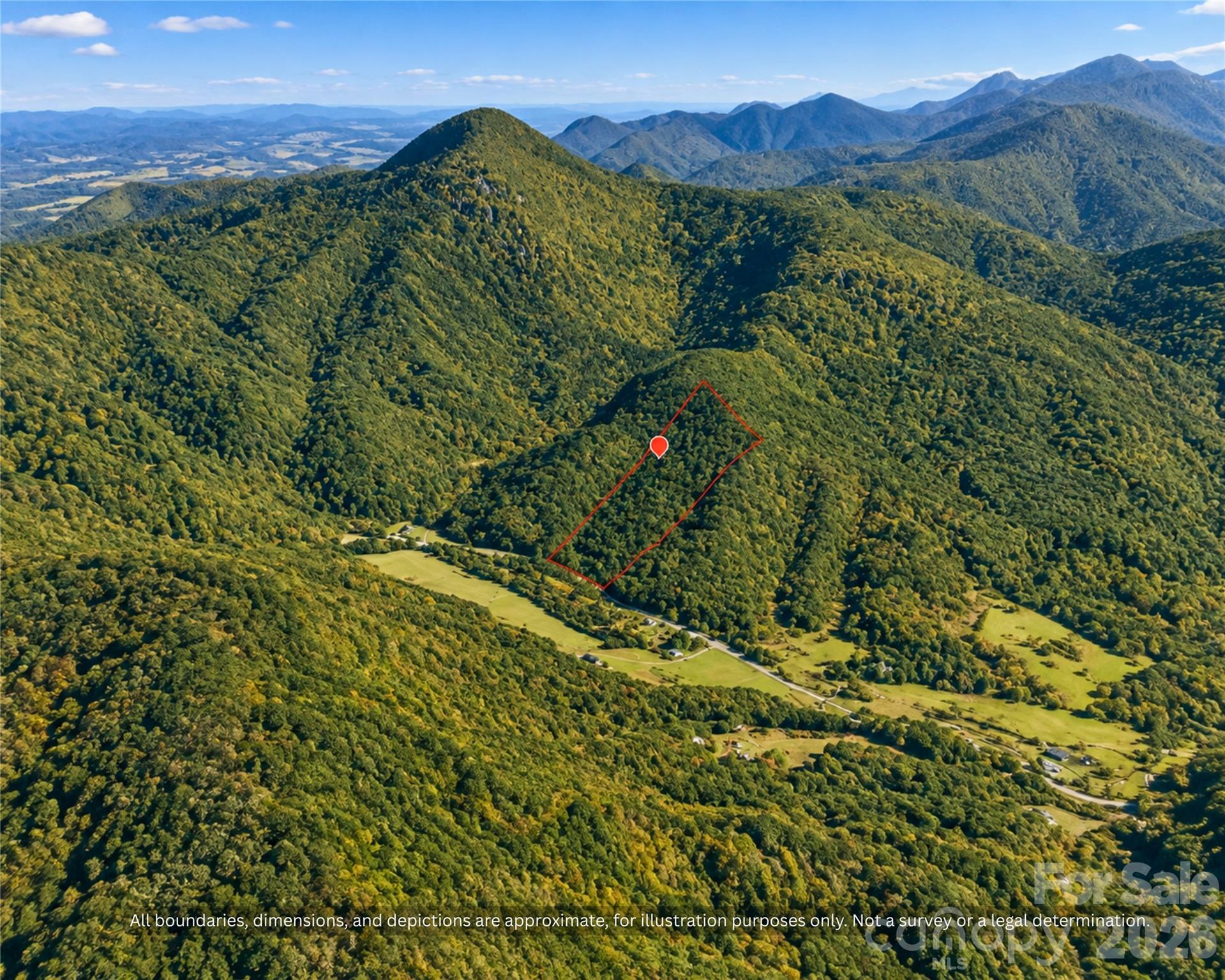 Wide aerial of wooded ridges and farm valleys in Alexander County, NC around this 9-acre property - 99999 Boone Gap Lane, Taylorsville