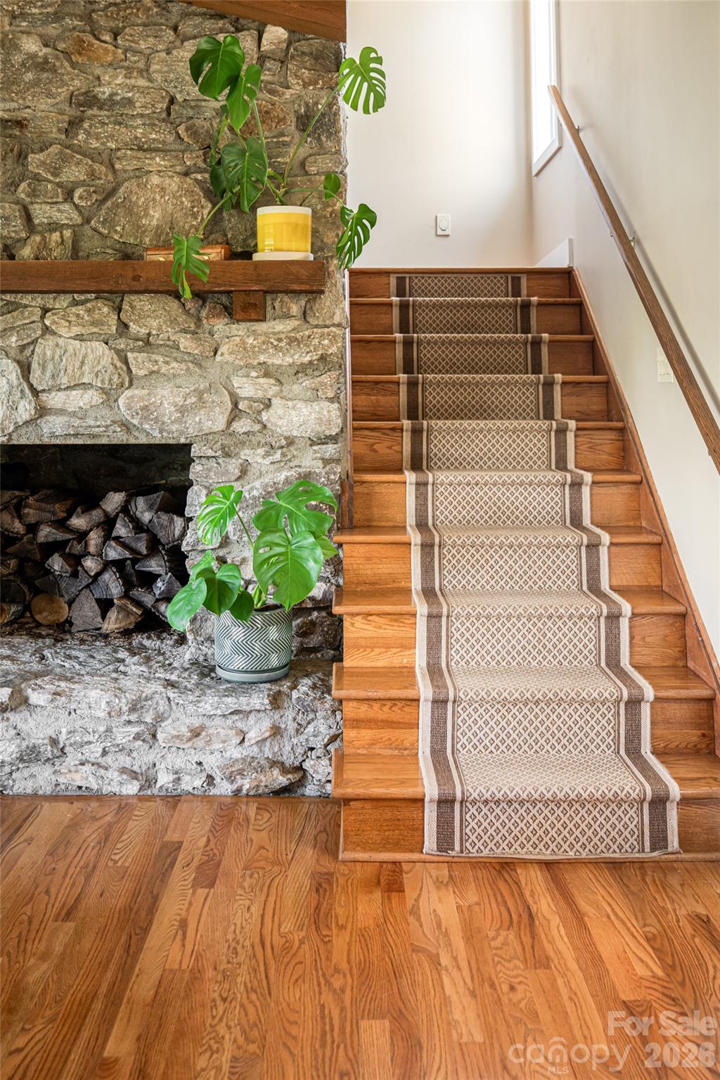Stairway to primary suite and guest suite - 79 Horizon Hill Road, Asheville