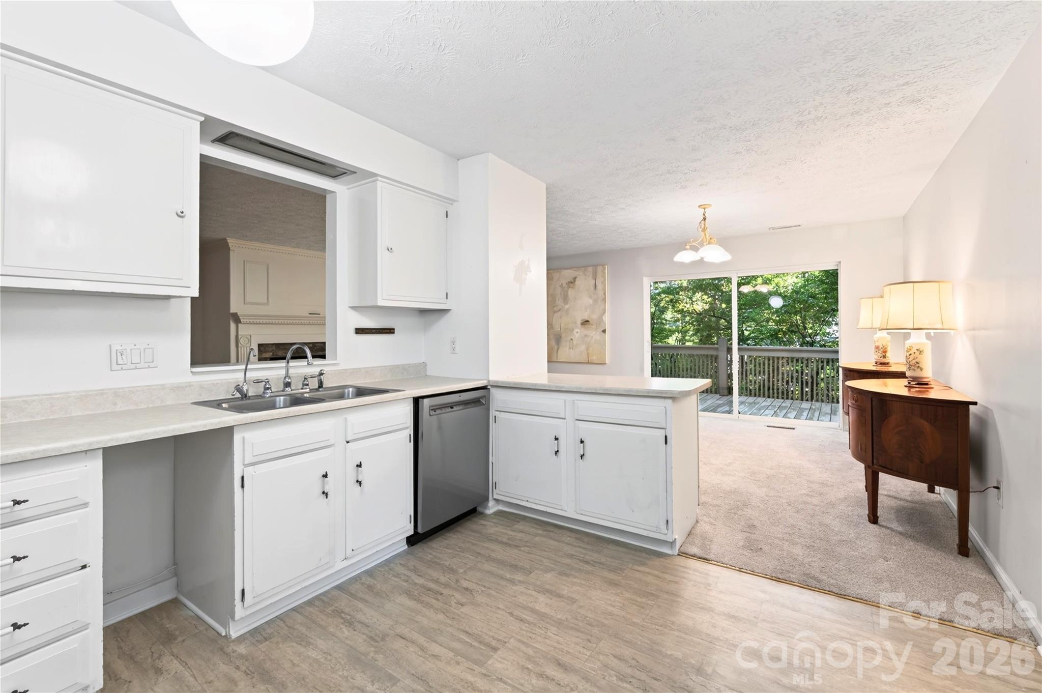 Kitchen opend to dining area - 112 Rhododendron Avenue, Black Mountain