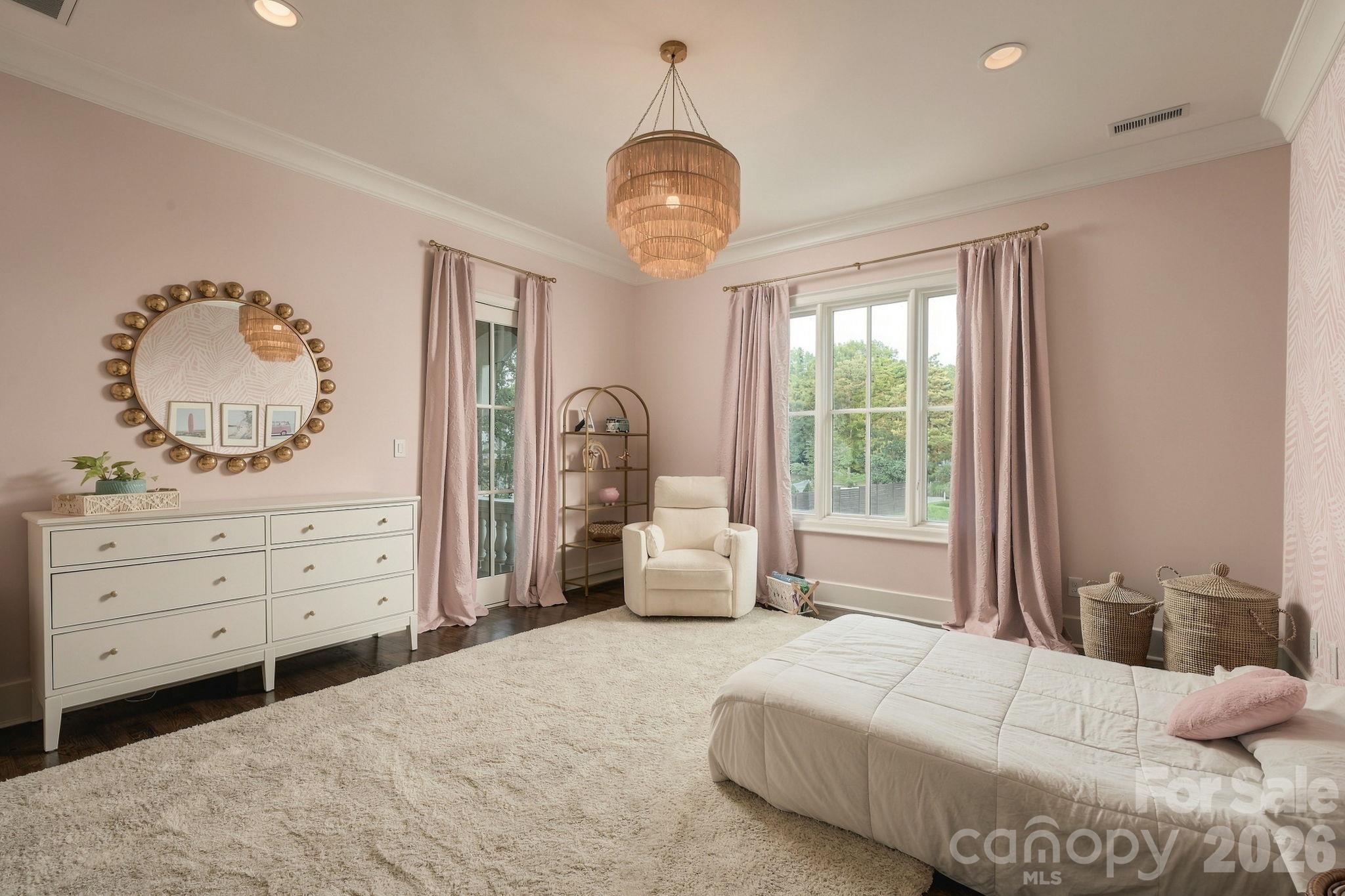 Bright bedroom 2 with ensuite bath and access to upstairs front deck! - 21215 Senlac Lane, Cornelius