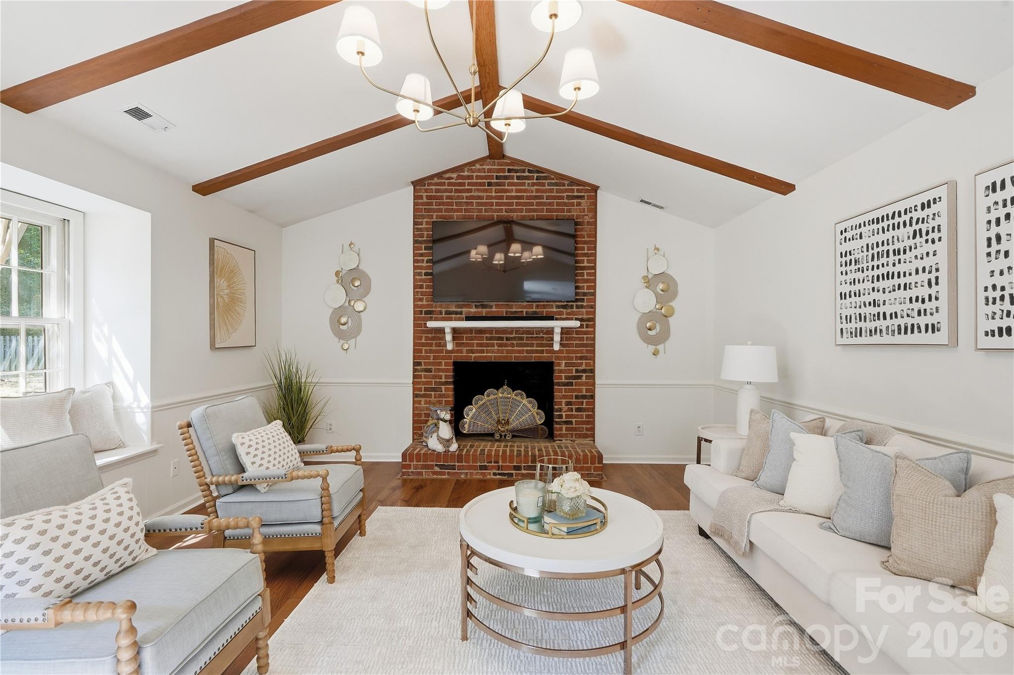 Cozy living room with wood burning fireplace - 717 Fredricksburg Road, Matthews