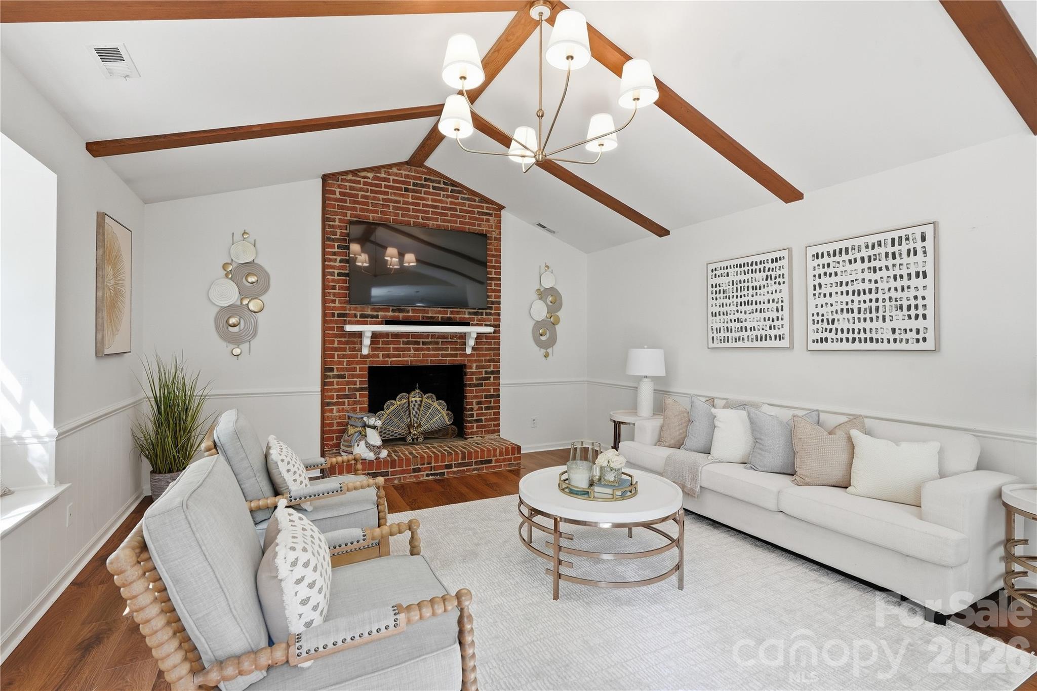 Cozy living room with wood burning fireplace - 717 Fredricksburg Road, Matthews