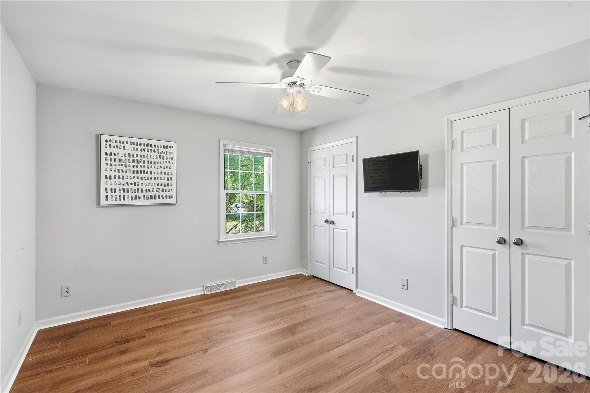 Bedroom #2 with wall length closet system and interior bathroom access - 717 Fredricksburg Road, Matthews