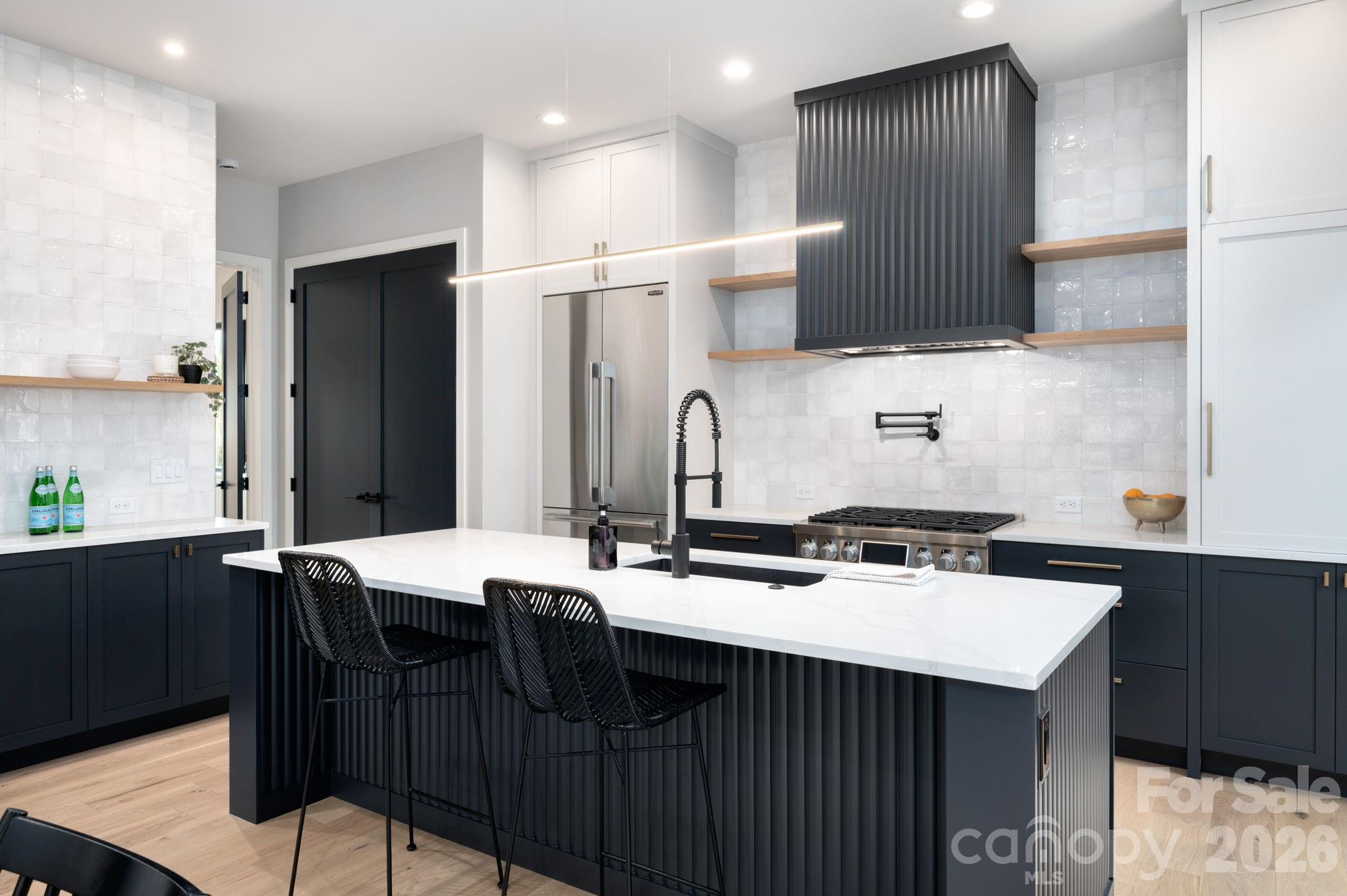 Spectacular Chef's Kitchen with Oversized Island, Quartz Counters and Luxury Appliances - 25 Ted Linn Drive, Fairview