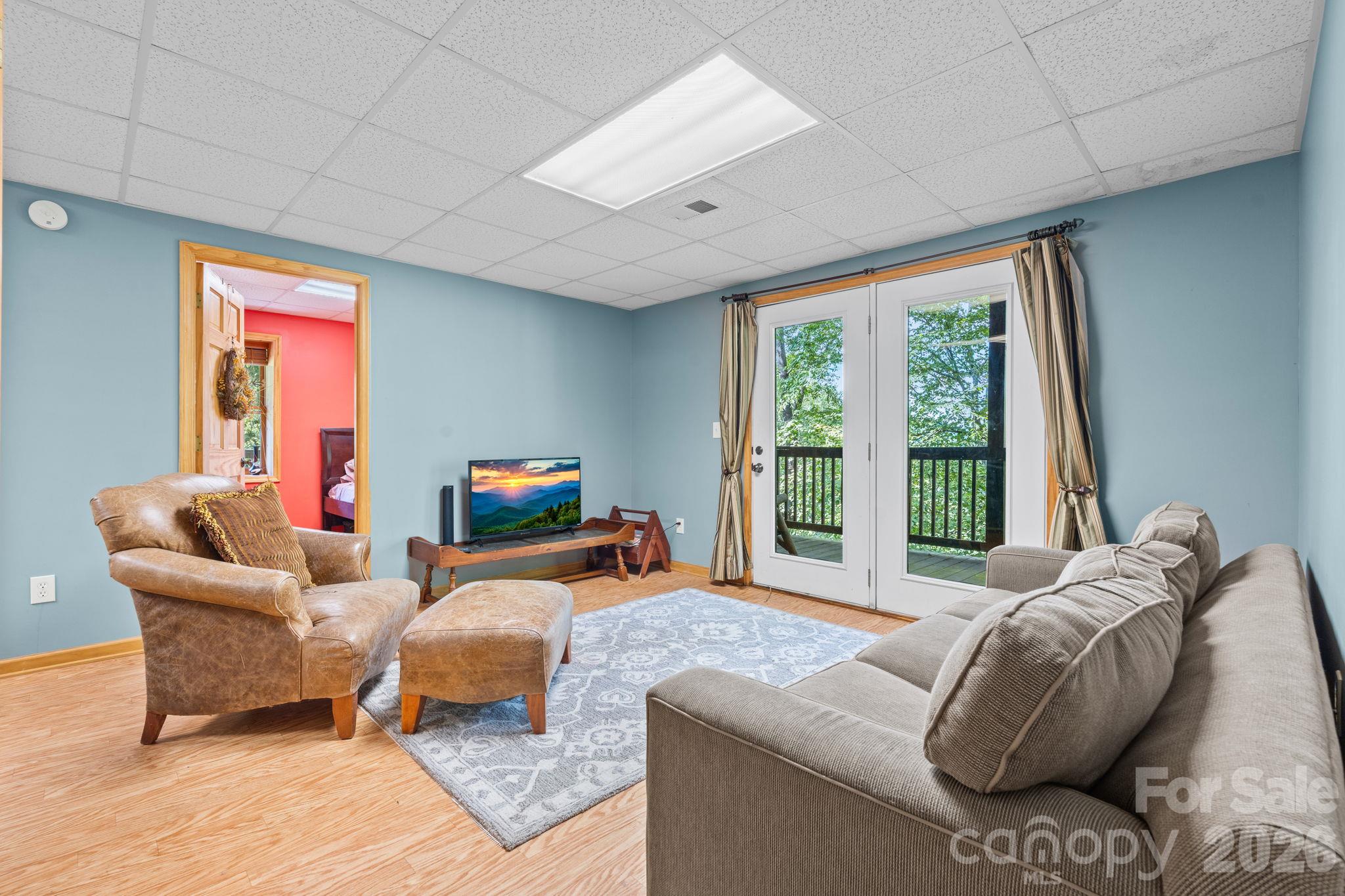 Lower Level Den - 1003 Deerwood Road, Piney Creek