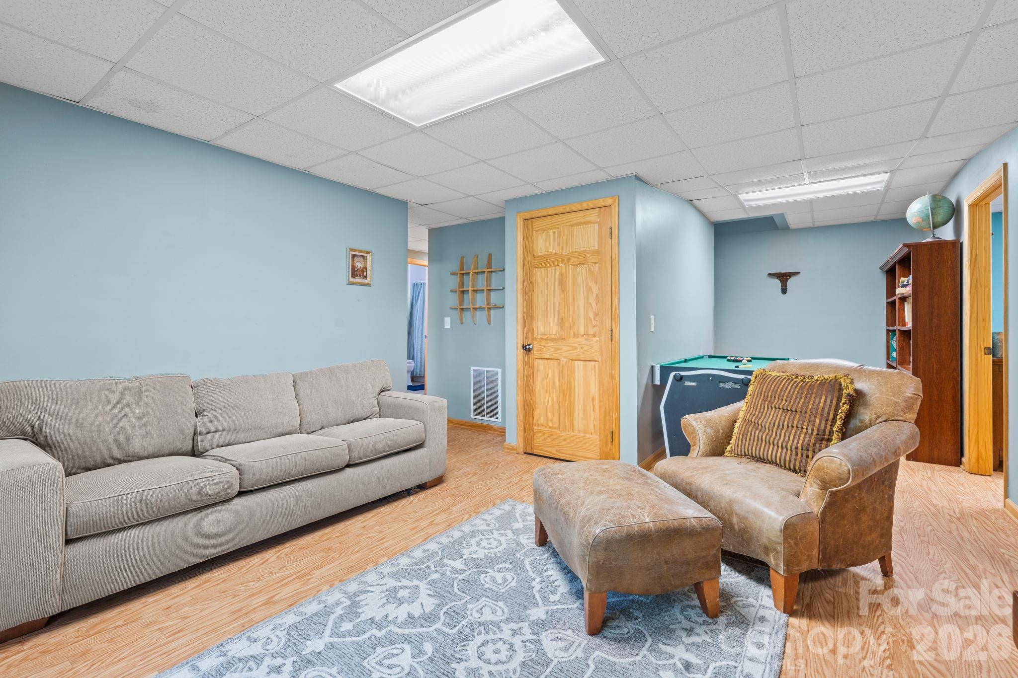 Lower Level Den - 1003 Deerwood Road, Piney Creek
