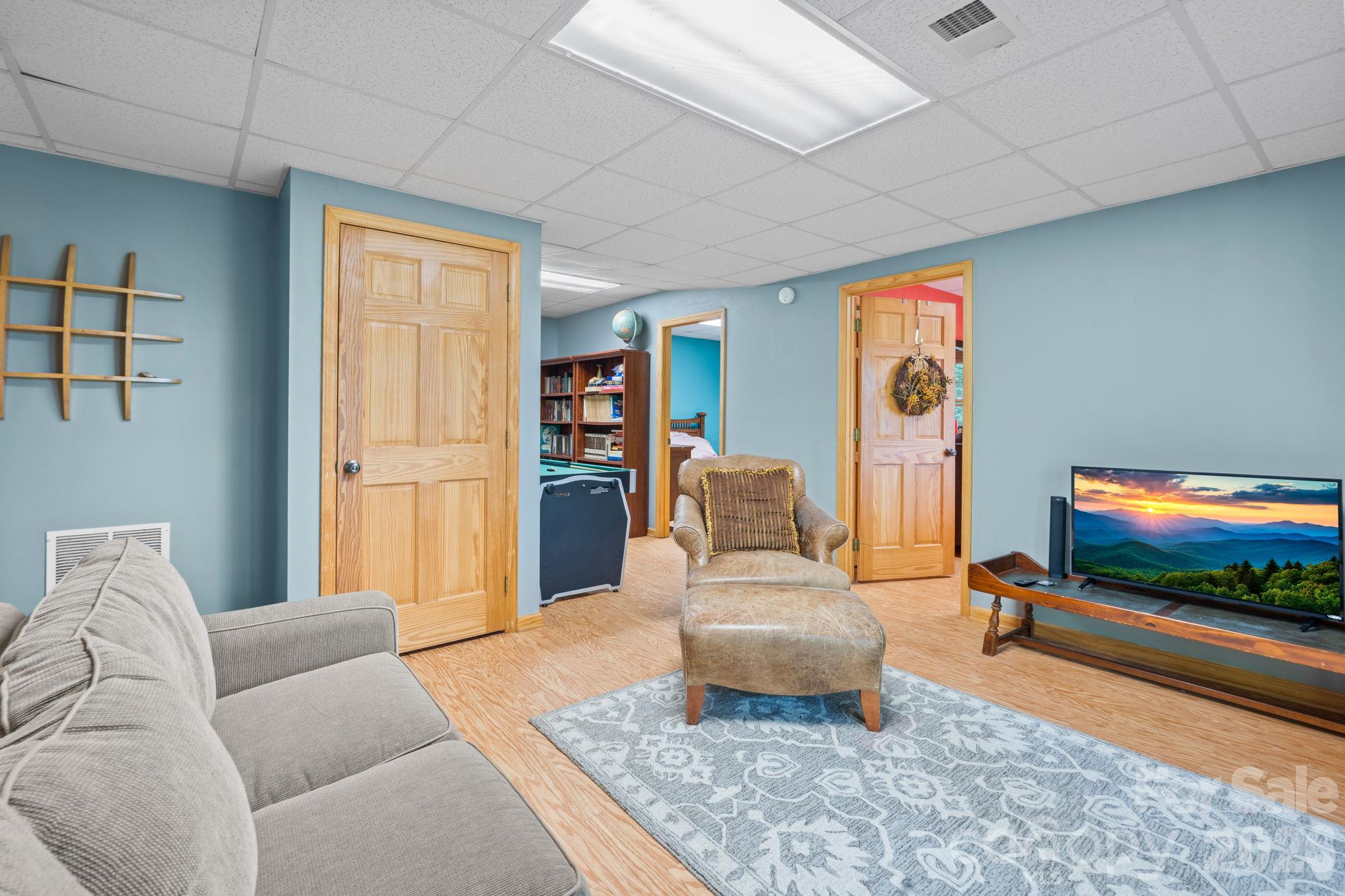 Lower Level Den - 1003 Deerwood Road, Piney Creek