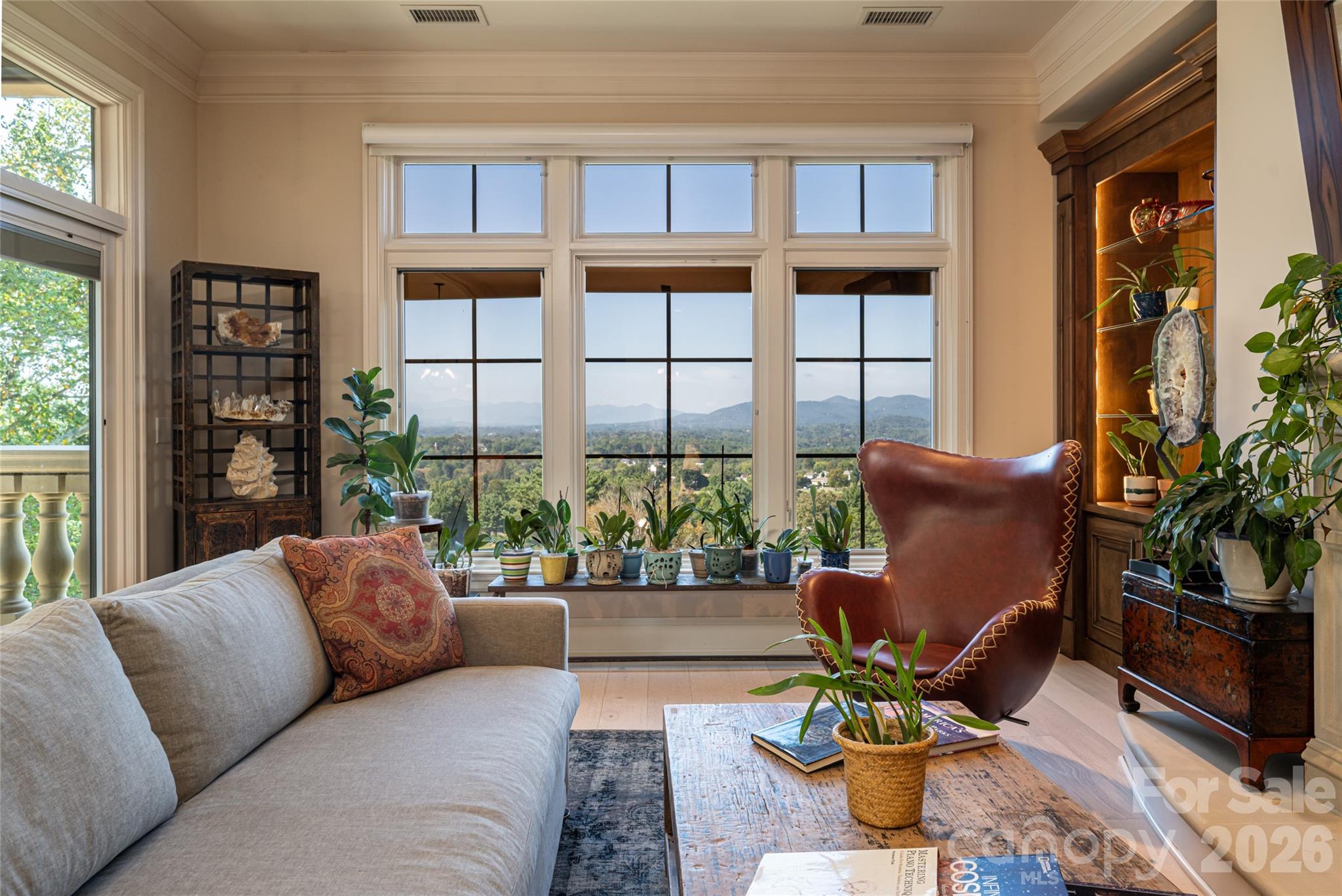 Wall of windows provides views of the Blue Ridge Mountains - 288 Macon Avenue, Asheville
