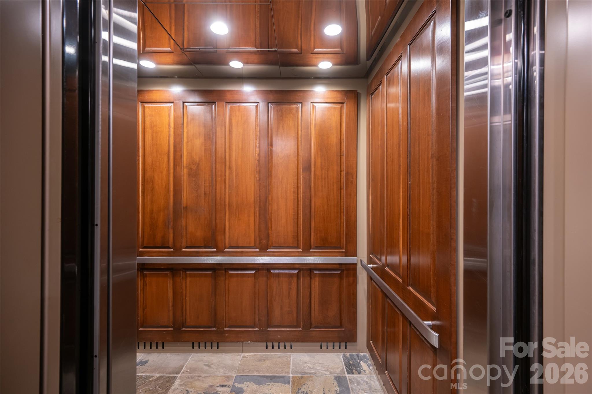 Large elevator services 6 condominiums on the building. - 288 Macon Avenue, Asheville