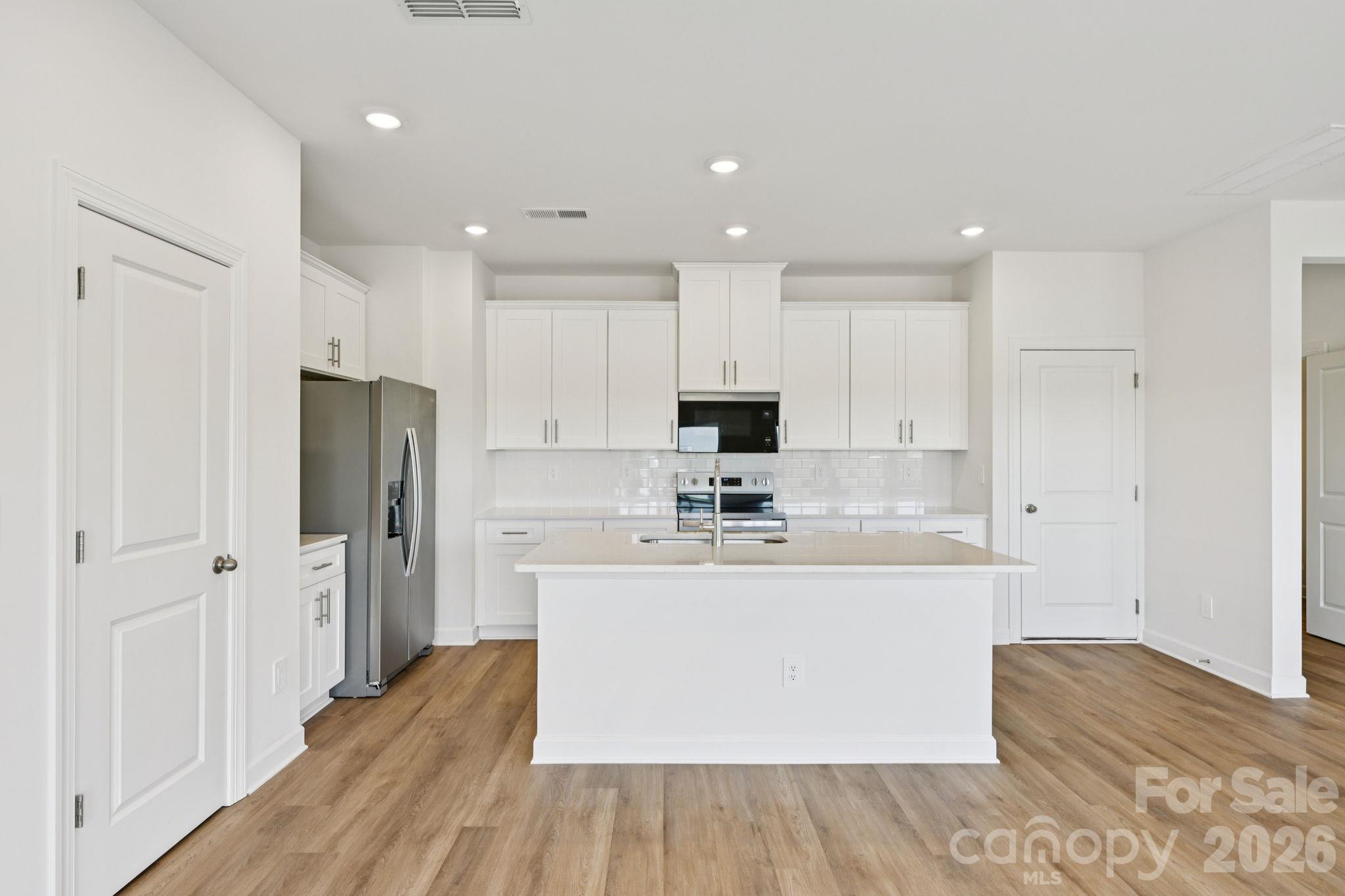 Photo is not of the actual home but is an inspirational photo of builder’s model home and may depict options, furnishings, and/or decorator features that are not included. - 3085 14th Avenue Avenue NE, Conover