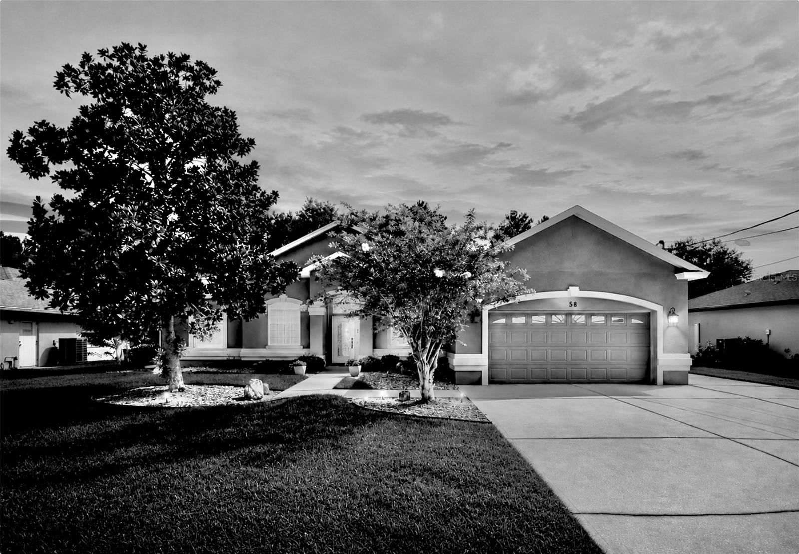 Black & White $AVINGS! - 58 BUTTERFIELD DR, PALM COAST