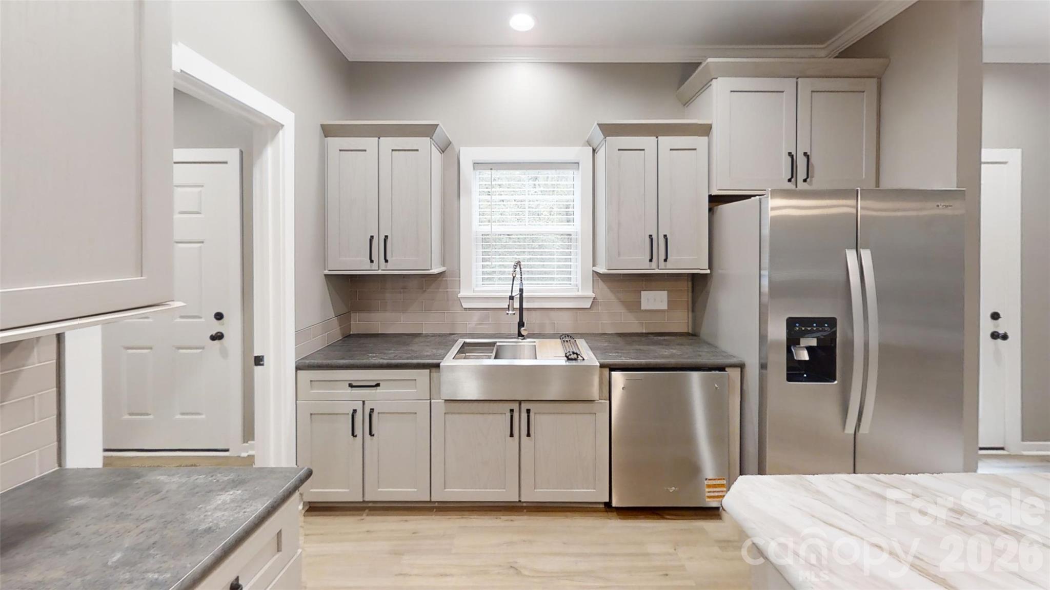 Kitchen with multi functional farm sink - 101 Riverhills Lane, Morganton
