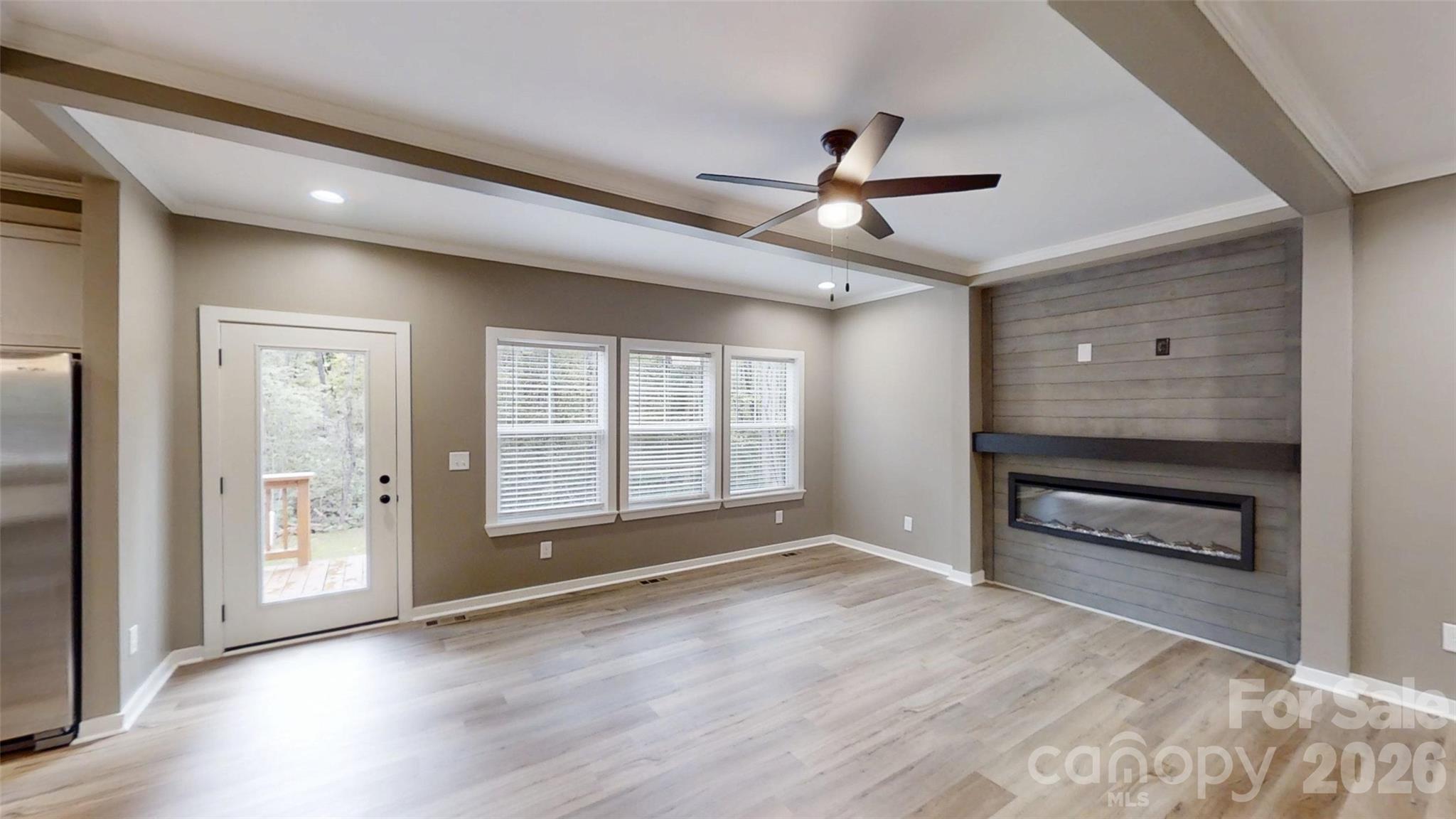 Living room with electric fireplace - 101 Riverhills Lane, Morganton