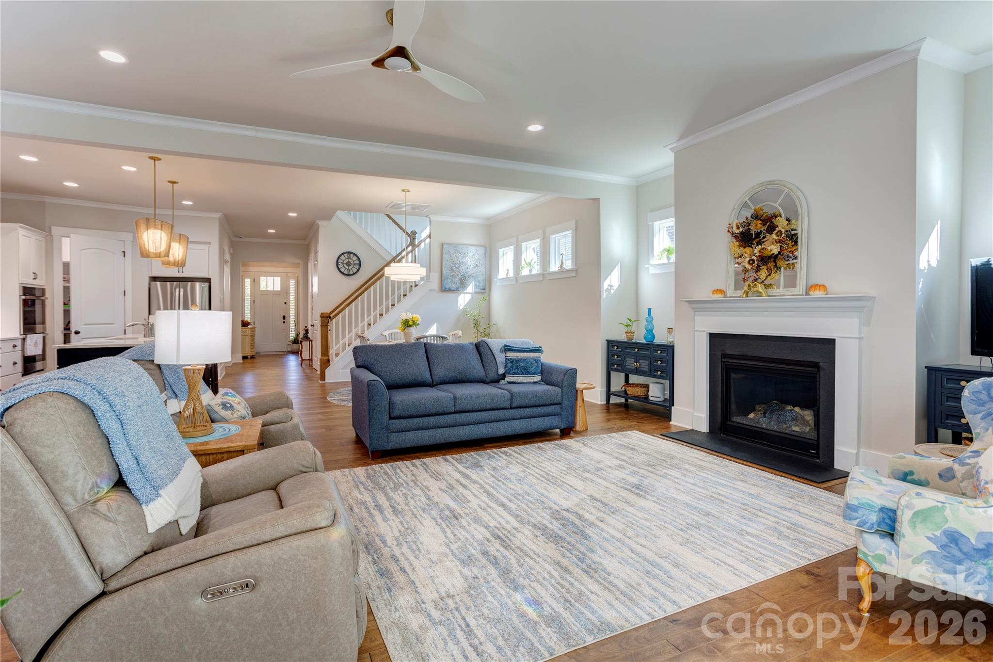 A gas fireplace adds warmth and ambiance at the flip of a switch. - 158 Fulworth Drive NW, Concord