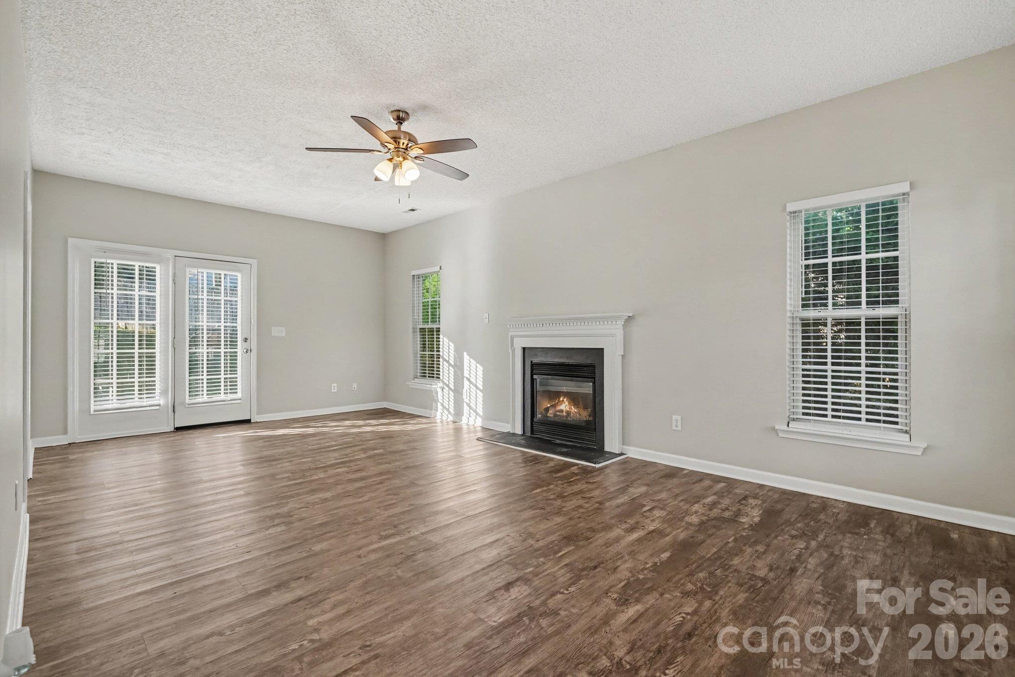 Single Family Residence at 1009 Sandy Point Drive SW, Concord, photo 2 of 17