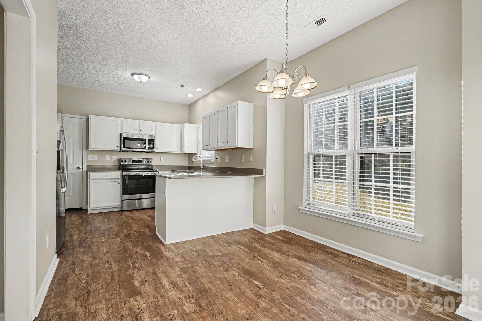 Single Family Residence at 1009 Sandy Point Drive SW, Concord, photo 4 of 17