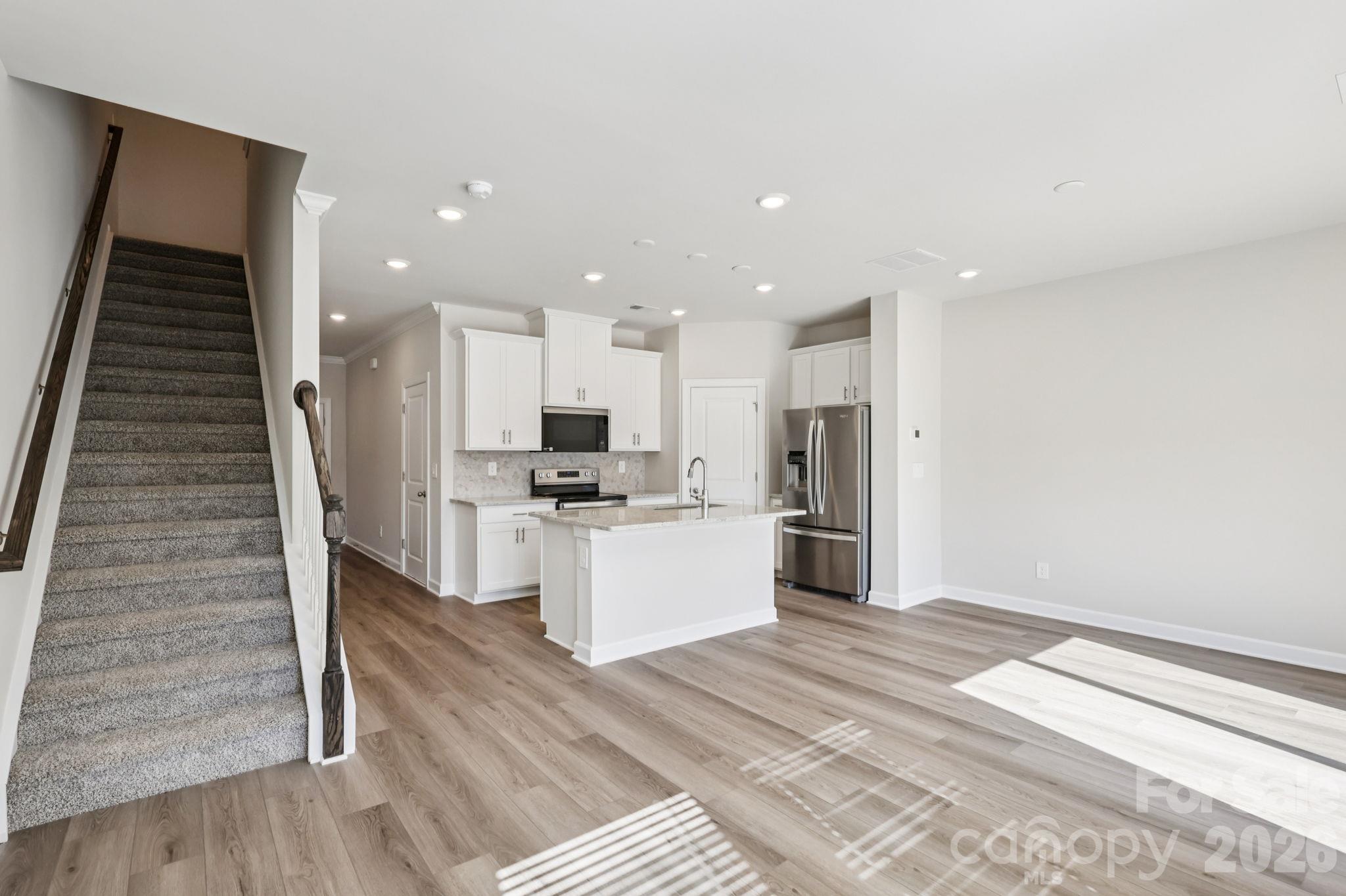 Photo is not of the actual home but is an inspirational photo of builder’s model home and may depict options, furnishings, and/or decorator features that are not included. - 8009 Hidden Springs Trail, Charlotte