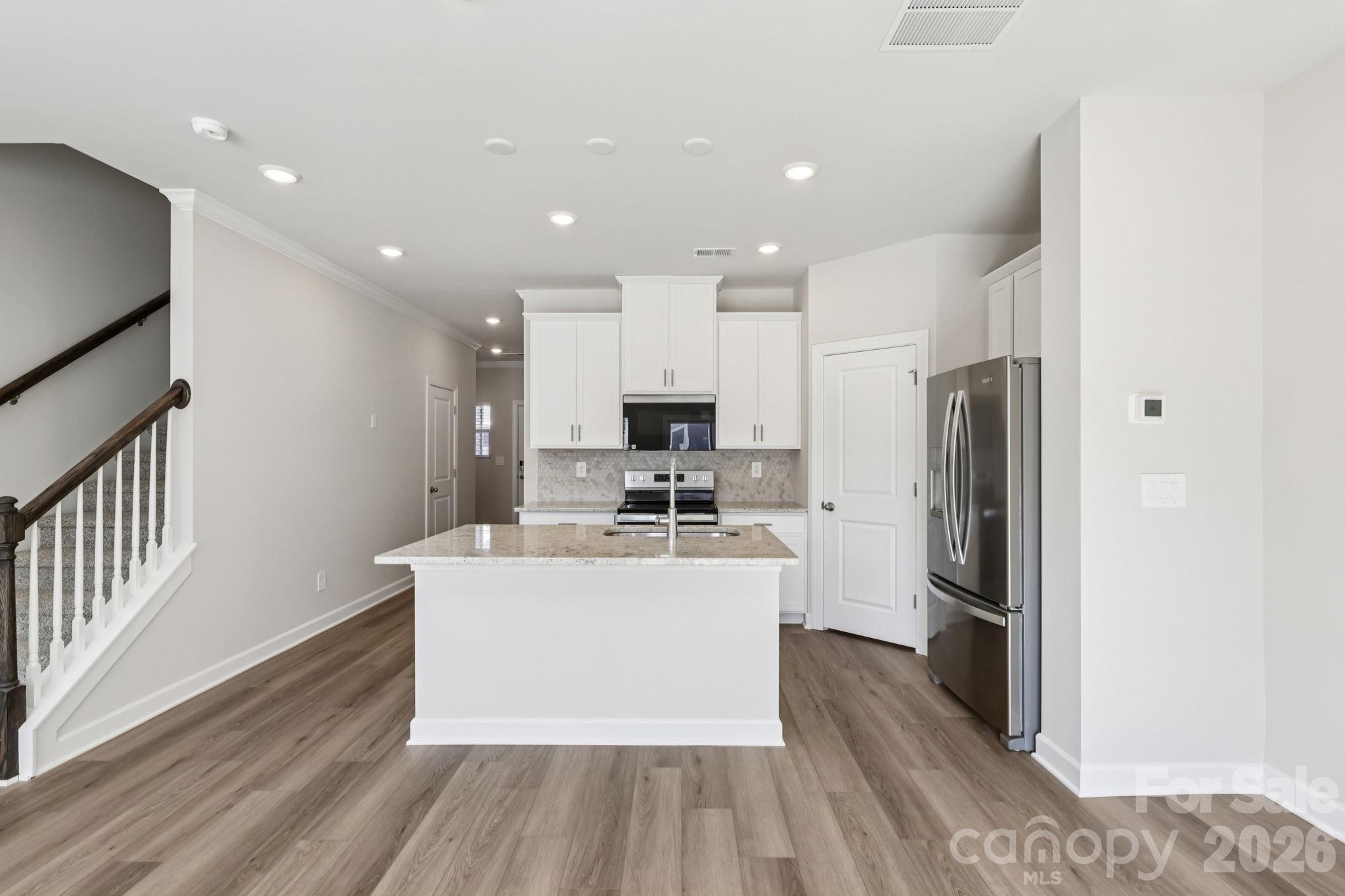 Photo is not of the actual home but is an inspirational photo of builder’s model home and may depict options, furnishings, and/or decorator features that are not included. - 8009 Hidden Springs Trail, Charlotte