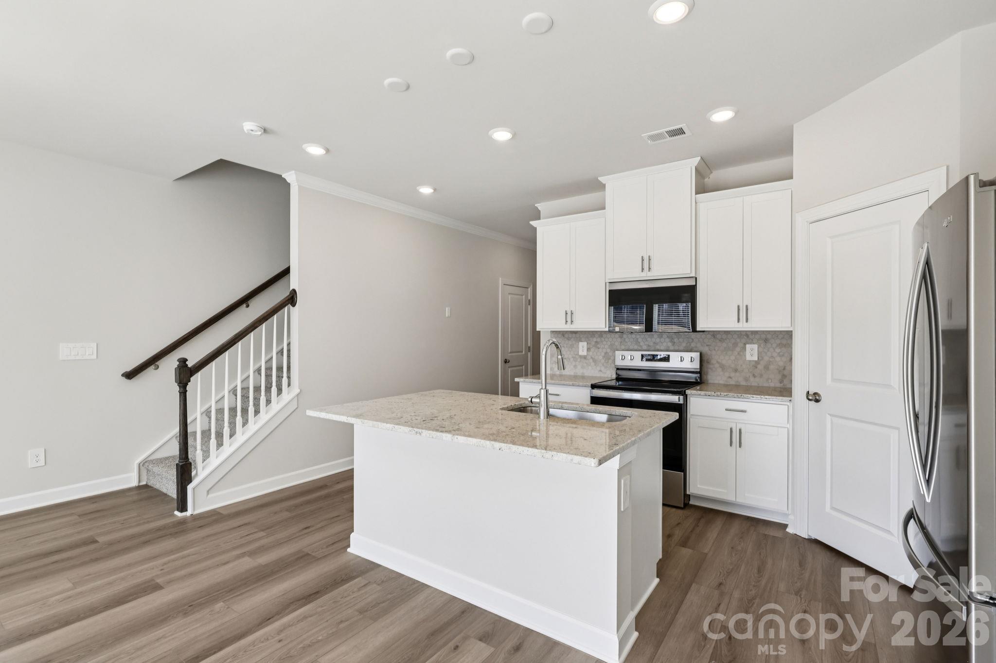 Photo is not of the actual home but is an inspirational photo of builder’s model home and may depict options, furnishings, and/or decorator features that are not included. - 8009 Hidden Springs Trail, Charlotte