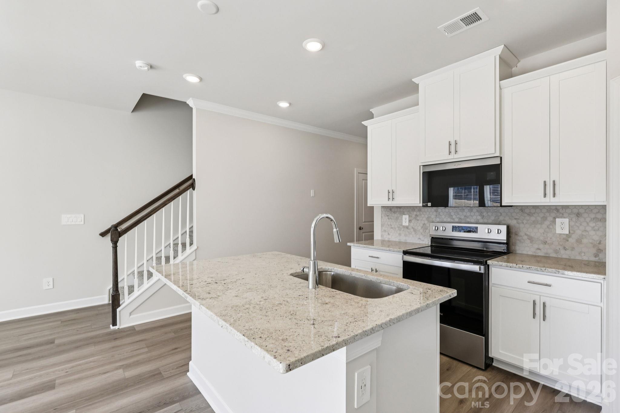 Photo is not of the actual home but is an inspirational photo of builder’s model home and may depict options, furnishings, and/or decorator features that are not included. - 8009 Hidden Springs Trail, Charlotte