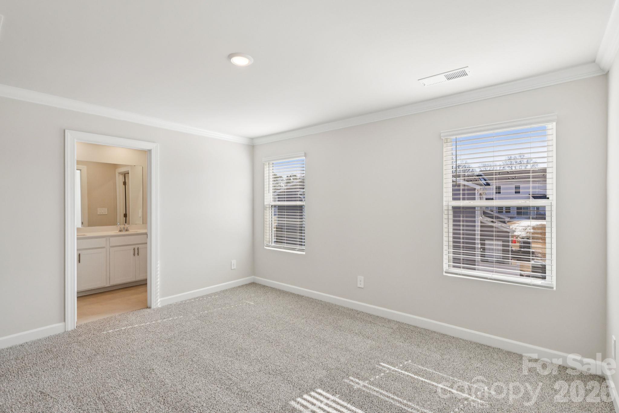 Photo is not of the actual home but is an inspirational photo of builder’s model home and may depict options, furnishings, and/or decorator features that are not included. - 8009 Hidden Springs Trail, Charlotte