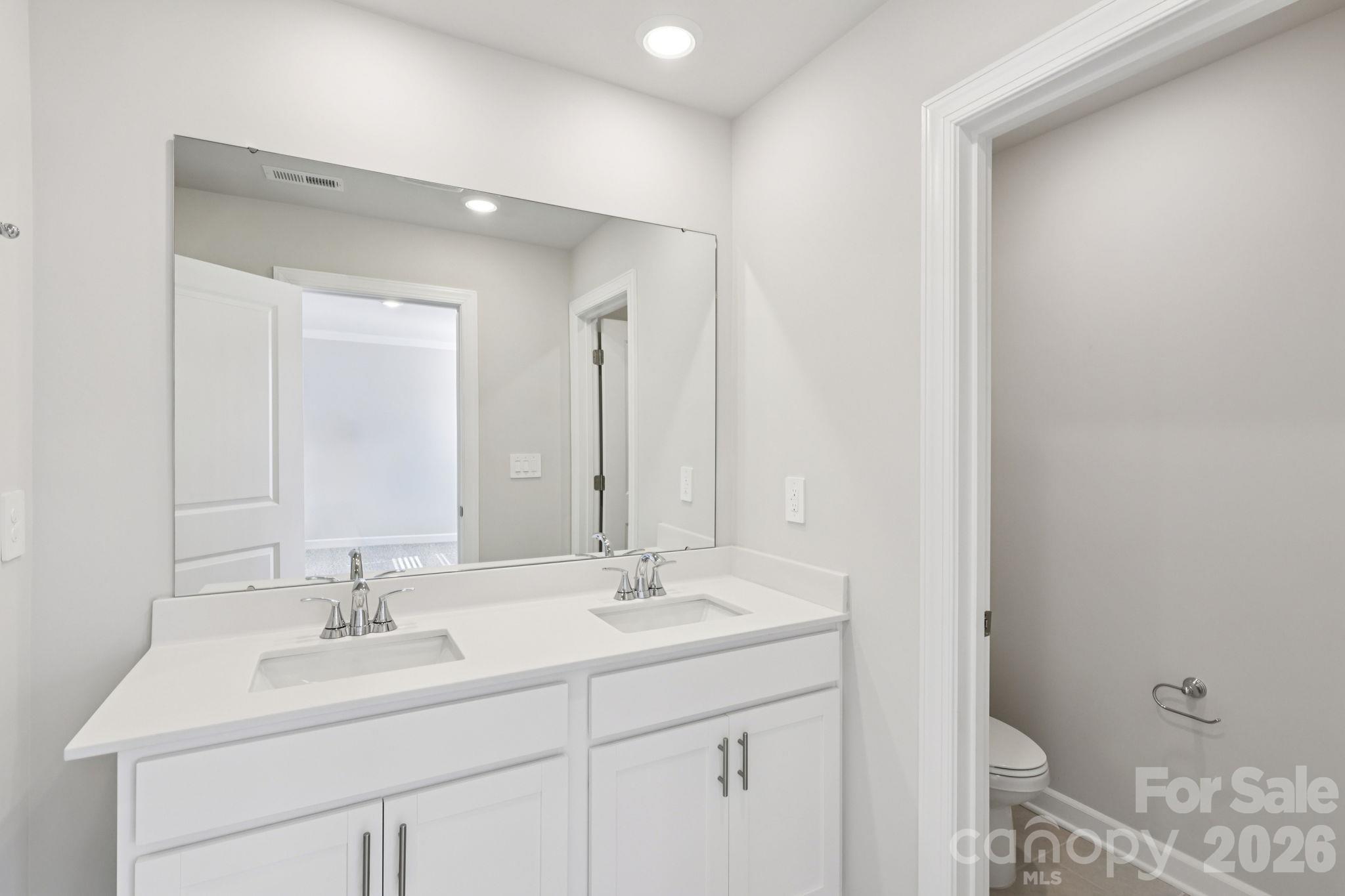 Photo is not of the actual home but is an inspirational photo of builder’s model home and may depict options, furnishings, and/or decorator features that are not included. - 8009 Hidden Springs Trail, Charlotte