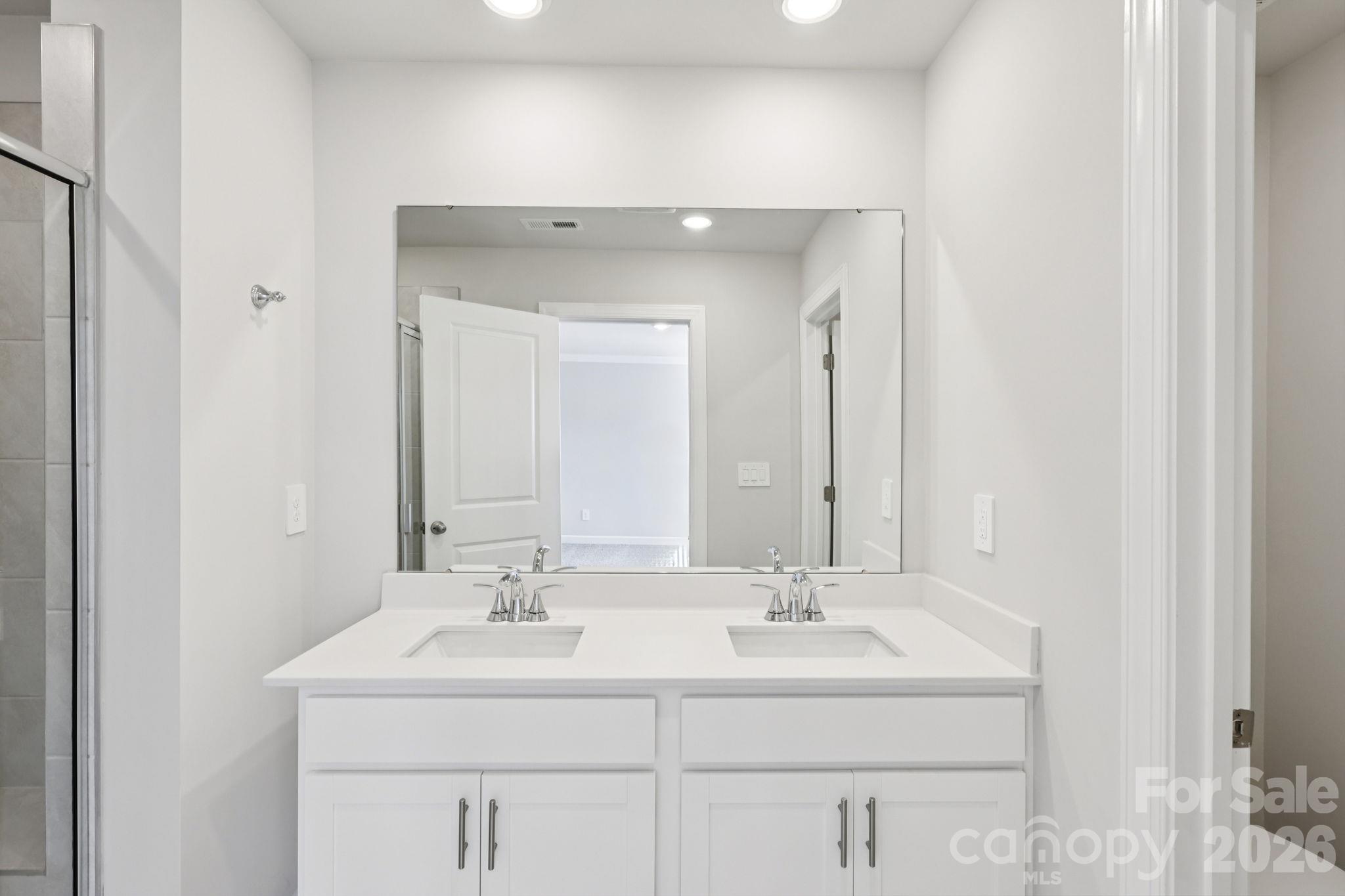 Photo is not of the actual home but is an inspirational photo of builder’s model home and may depict options, furnishings, and/or decorator features that are not included. - 8009 Hidden Springs Trail, Charlotte