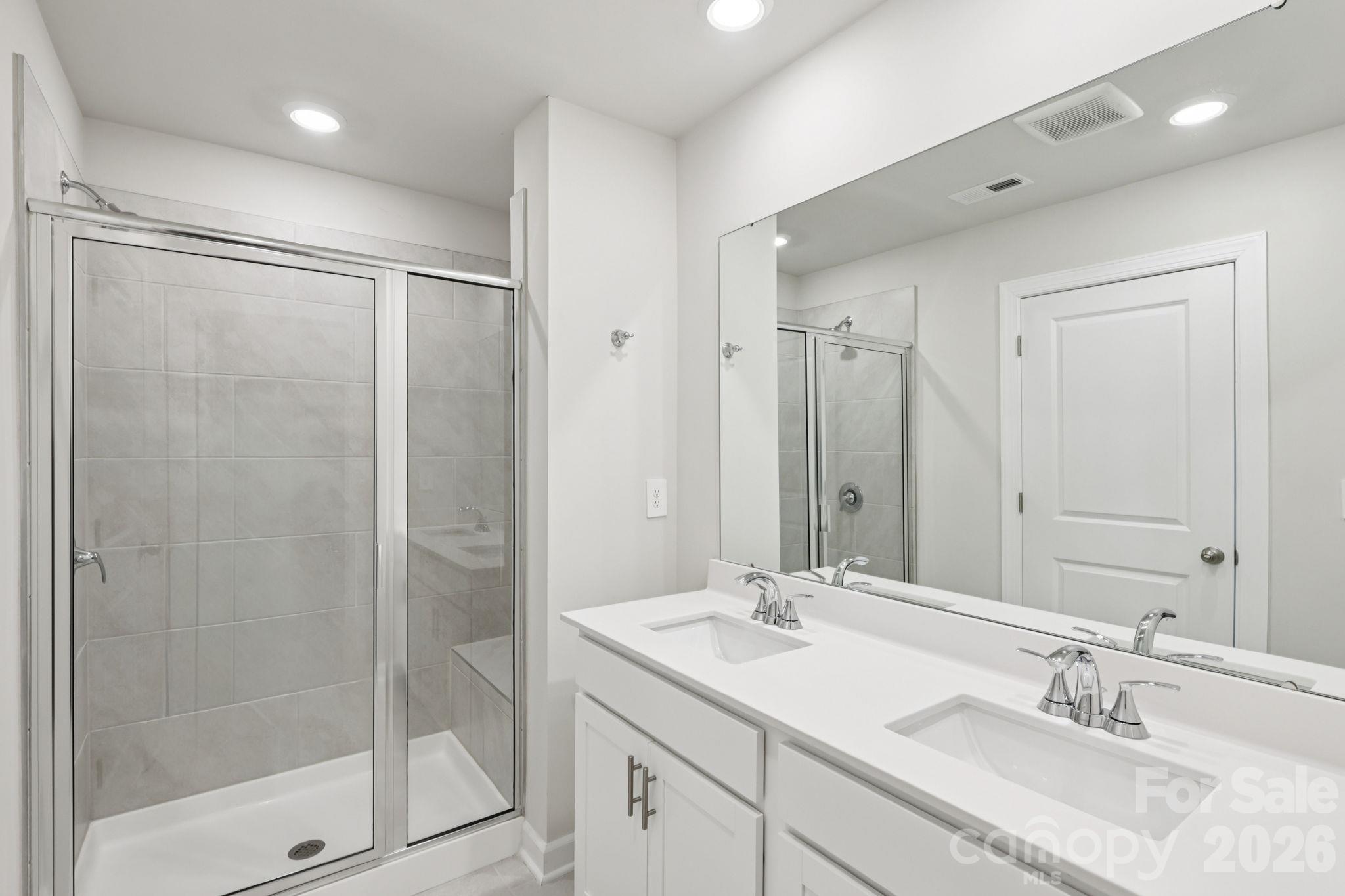 Photo is not of the actual home but is an inspirational photo of builder’s model home and may depict options, furnishings, and/or decorator features that are not included. - 8009 Hidden Springs Trail, Charlotte