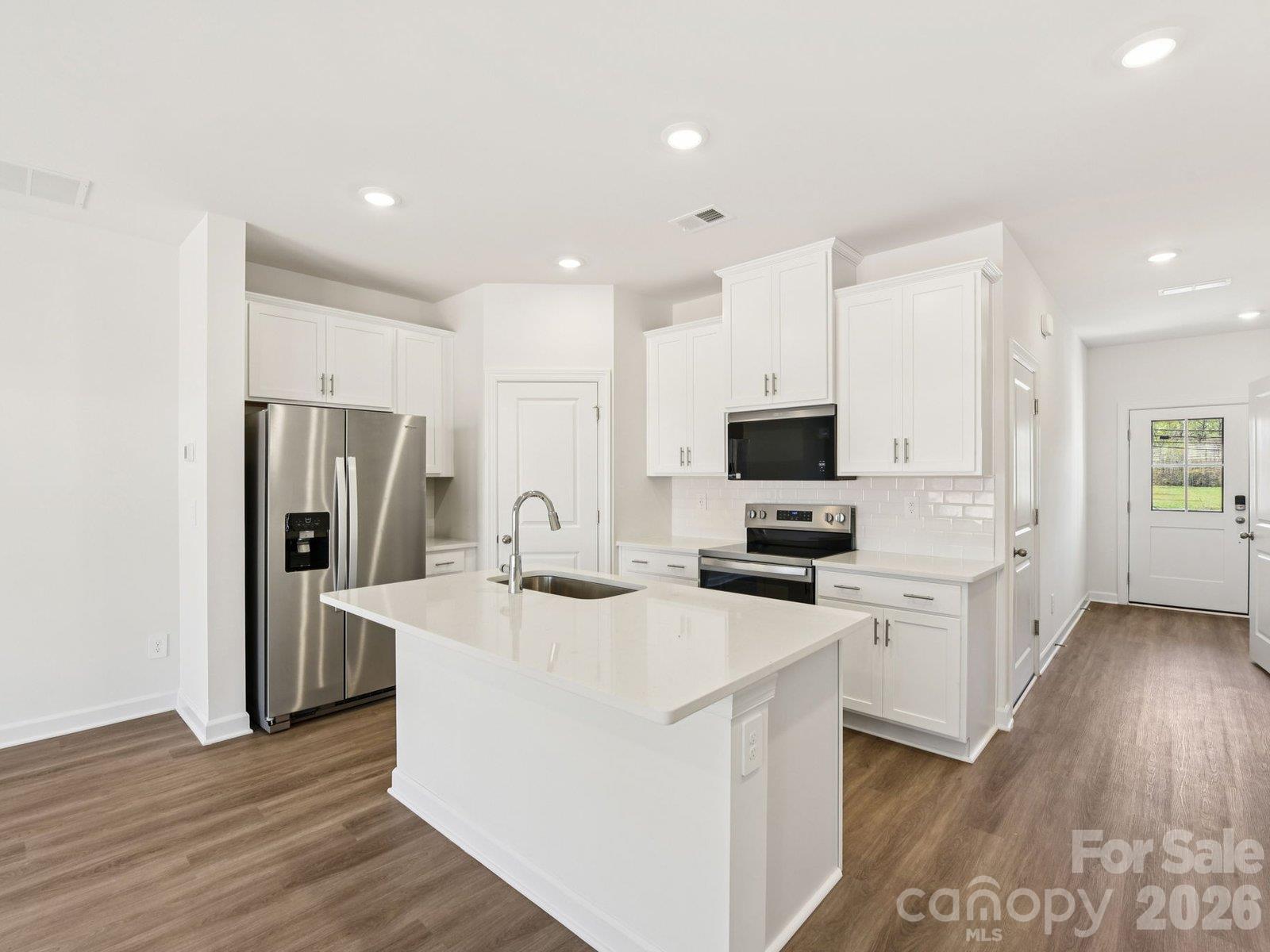 Photo is not of the actual home but is an inspirational photo of builder’s model home and may depict options, furnishings, and/or decorator features that are not included. - 1120 Rosetta Drive, Salisbury