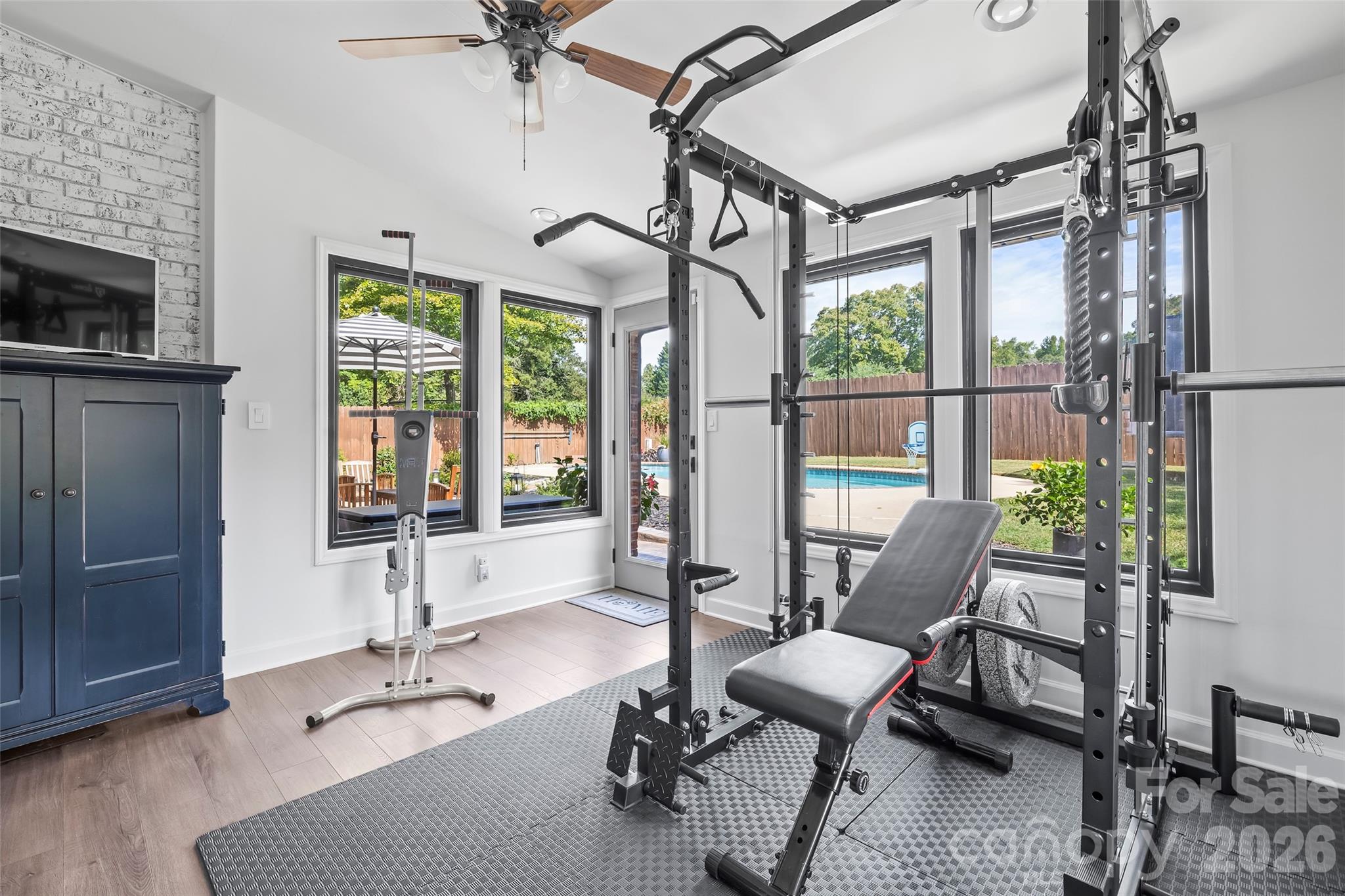 Sunroom, currently used as a gym - 241 Linville Drive, Matthews