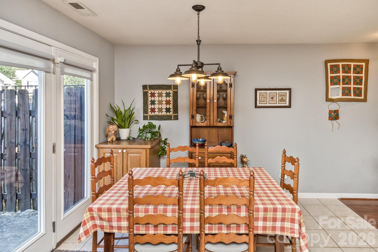 Dining area with overhead chandelier - 5 Lilac Fields Way, Arden