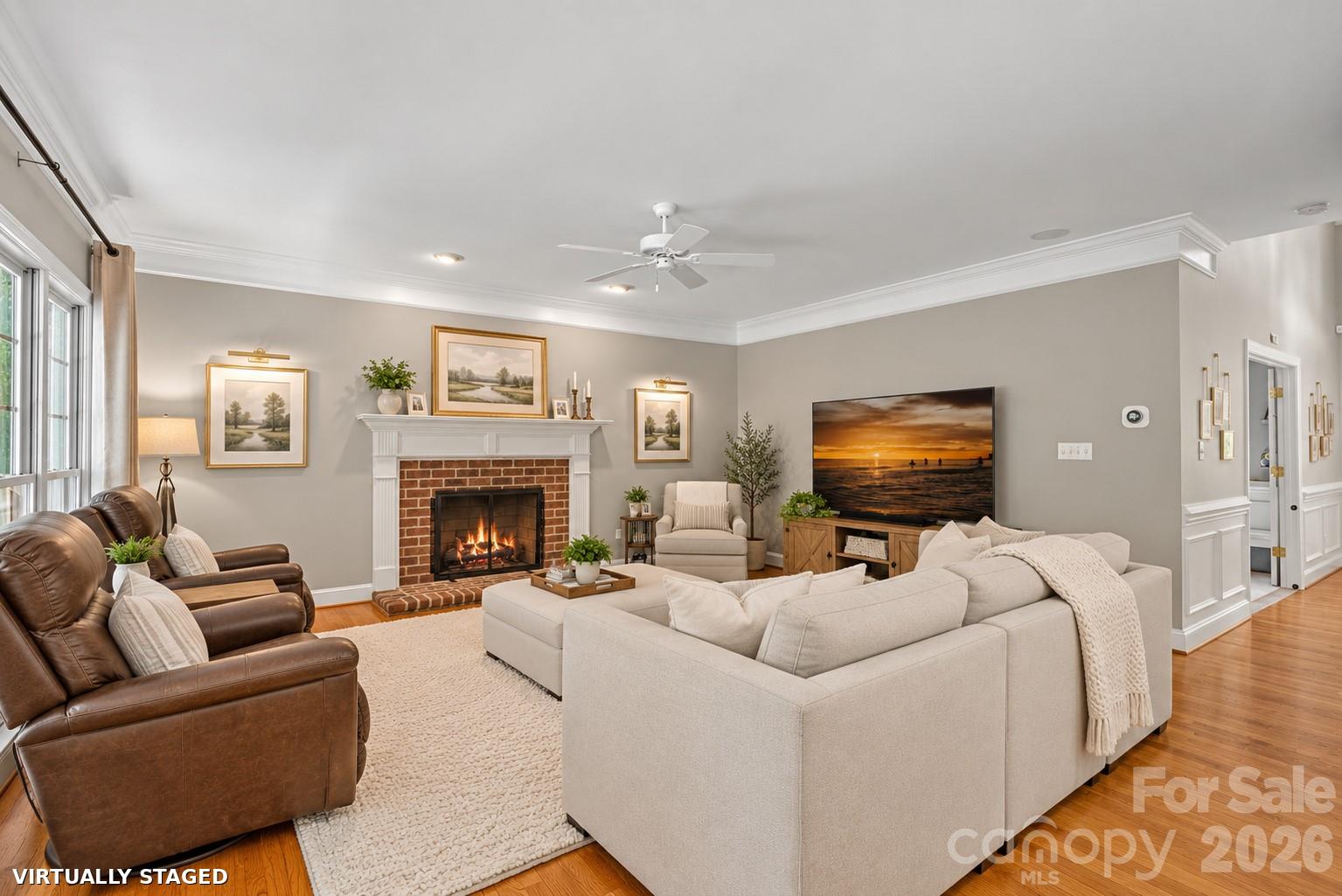 Brand new Benjamin Moore Calm throughout most of downstairs. Greenery and art virtually staged. - 2401 Flagstick Drive, Matthews