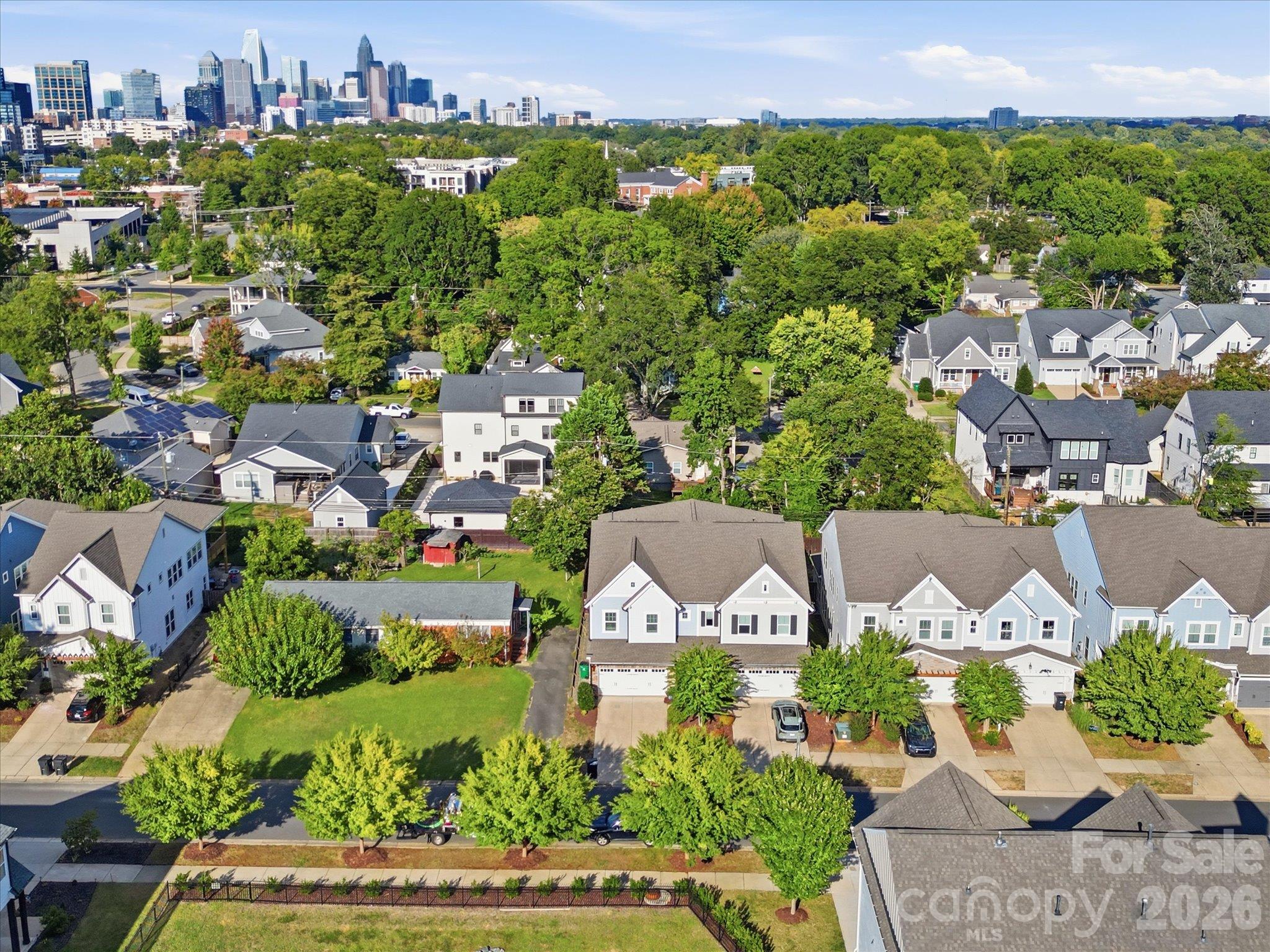 Drone view of the neighborhood and Charlotte skyline, highlighting how close this end-unit townhome sits to South End and Uptown Charlotte. - 337 Belton Street, Charlotte